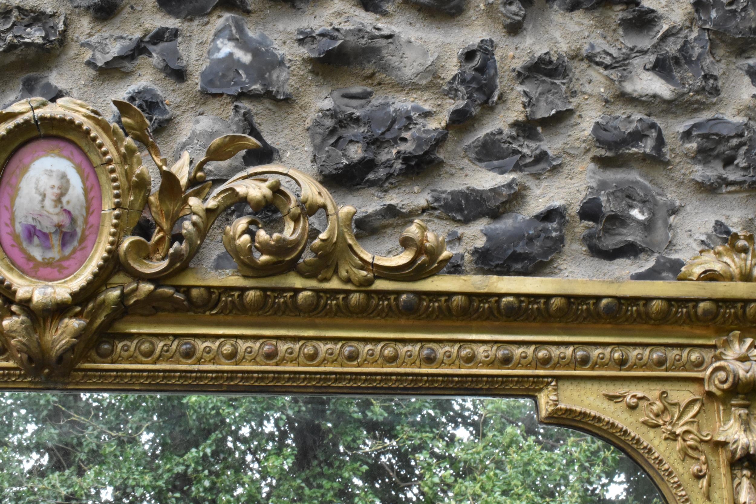 A 19th century French Louis XVI style large gilt wall mirror, having a sevres style painted plaque - Image 10 of 13