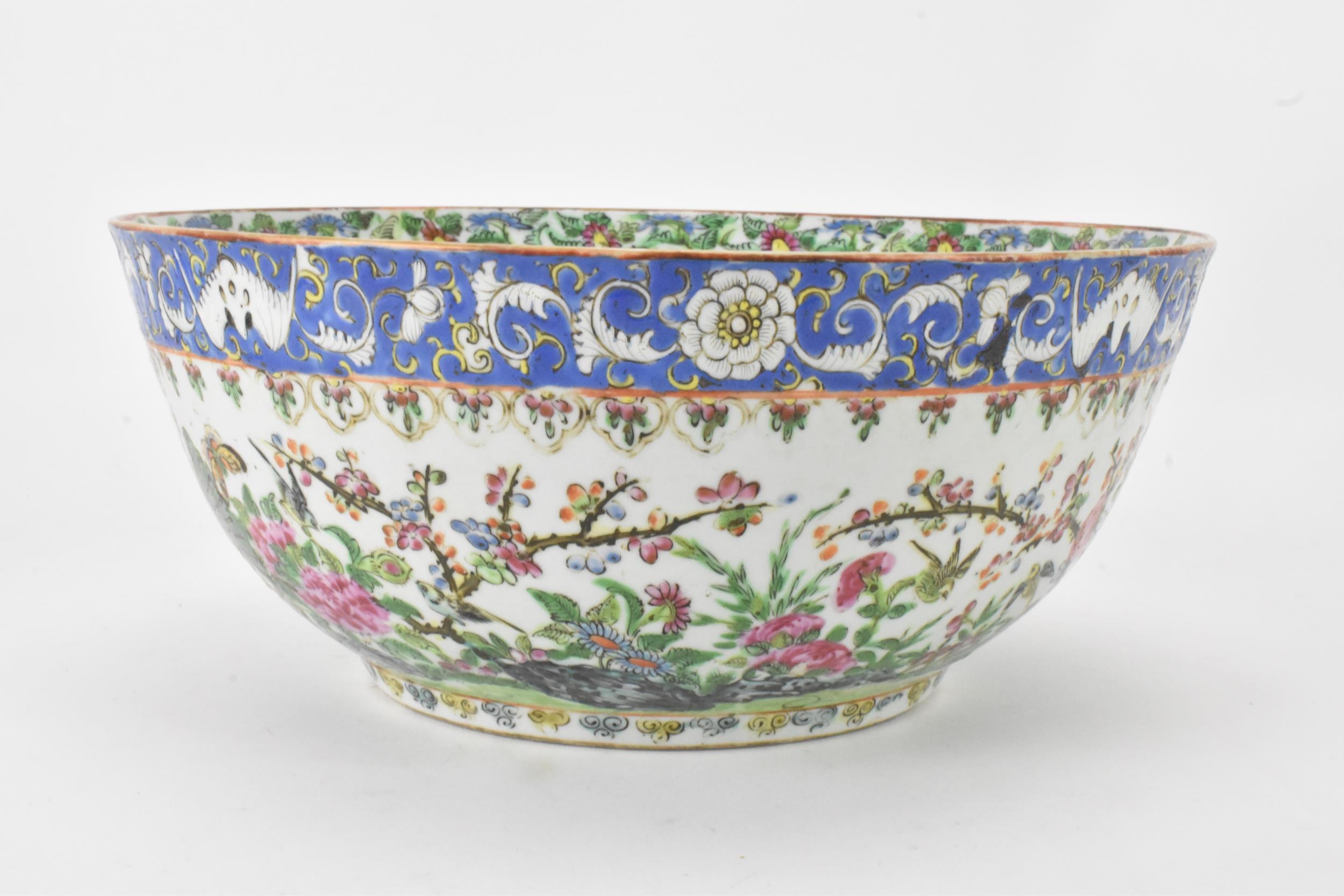 A near pair of Chinese export Canton famille rose punch bowls, Qing dynasty, late 19th century, - Image 12 of 15