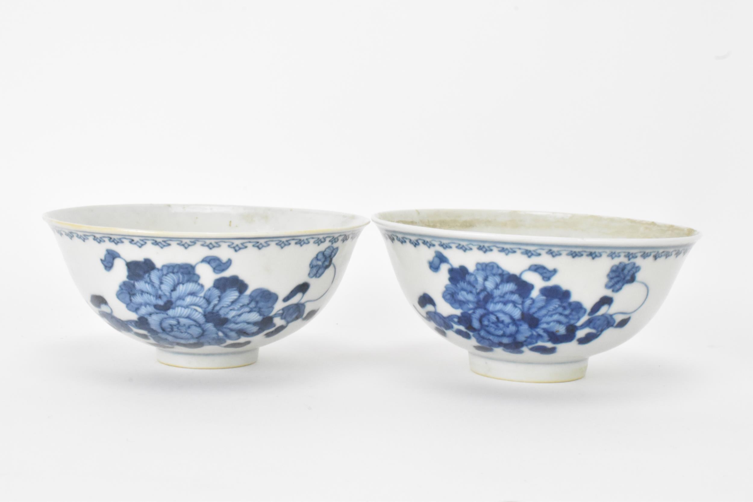 A set of four Qing dynasty, Guangxu period blue and white porcelain bowls, with floral decoration, - Image 7 of 9