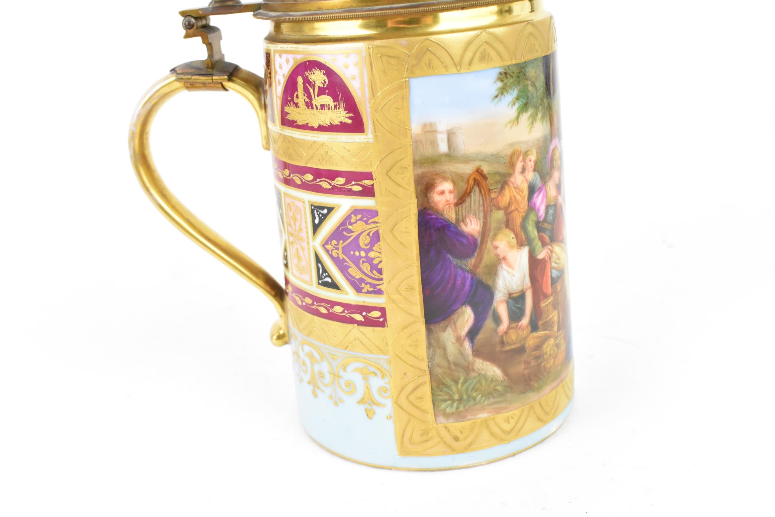 A brass-mounted Royal Vienna porcelain tankard, of cylindrical form painted with a figurative - Image 5 of 9