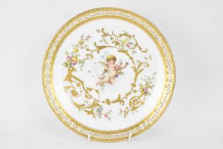 A late 19th century Mintons porcelain cabinet plate, signed Anton Boullemier, painted with a