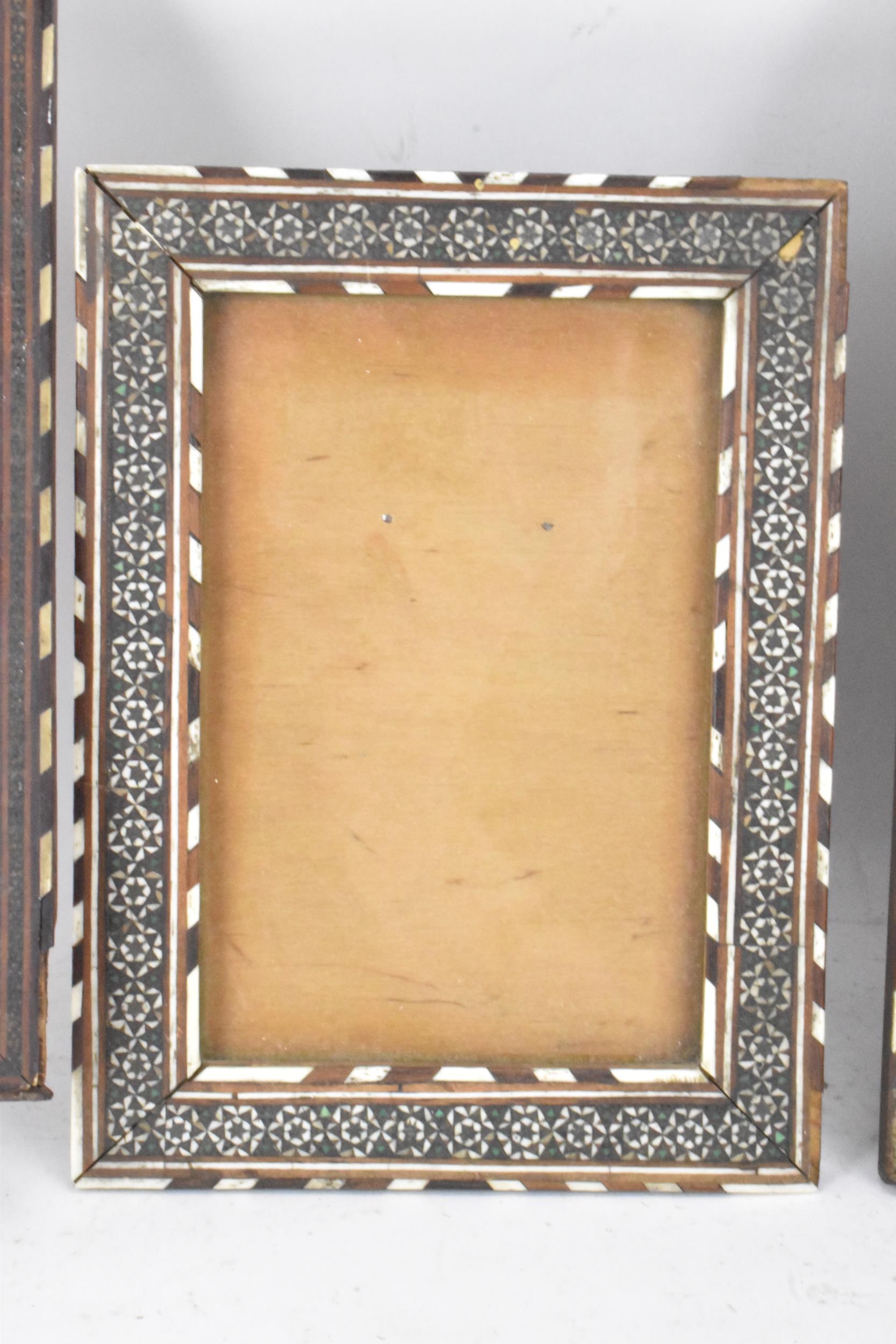 Three similar Persian late Qajar dynasty photograph frames, the profusely inlaid frames having - Image 6 of 14
