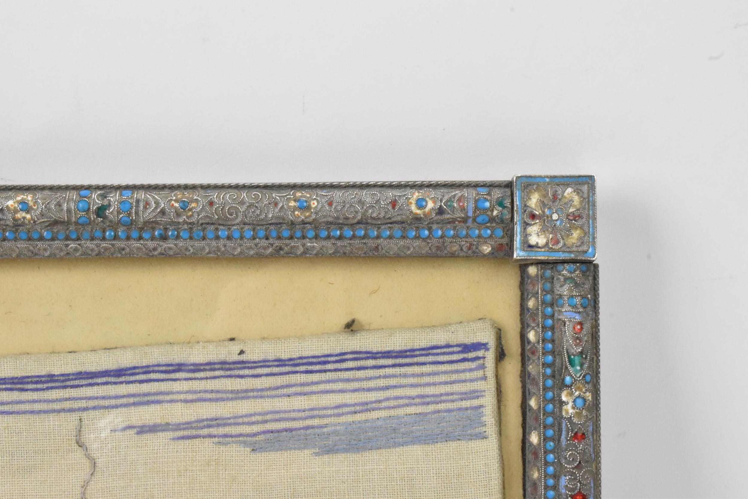 A Russian silver early 20th century champleve enamel photograph frame, inset with a tapestry and - Image 2 of 15