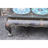 A Chinese 20th century cloisonne coffee table, the black lacquered low coffee table with a