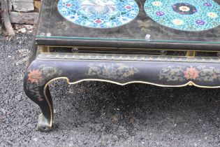 A Chinese 20th century cloisonne coffee table, the black lacquered low coffee table with a