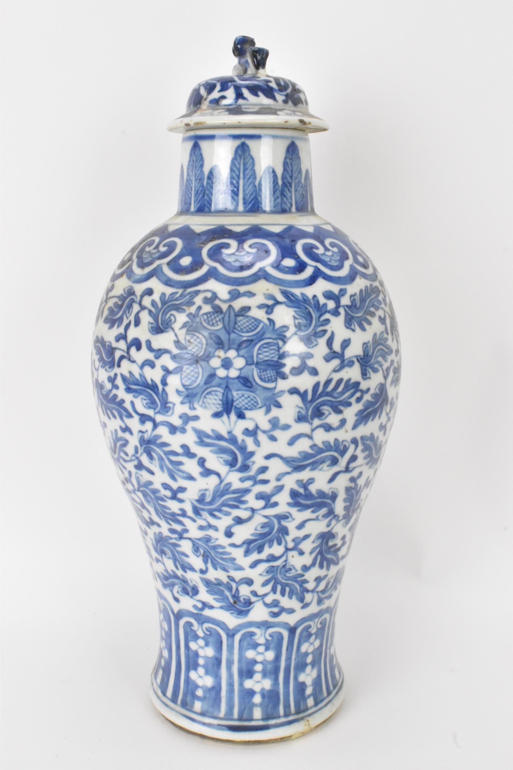 A Chinese Qing dynasty blue and white lidded vase, late 19th century, baluster shape with Xuande - Image 4 of 7