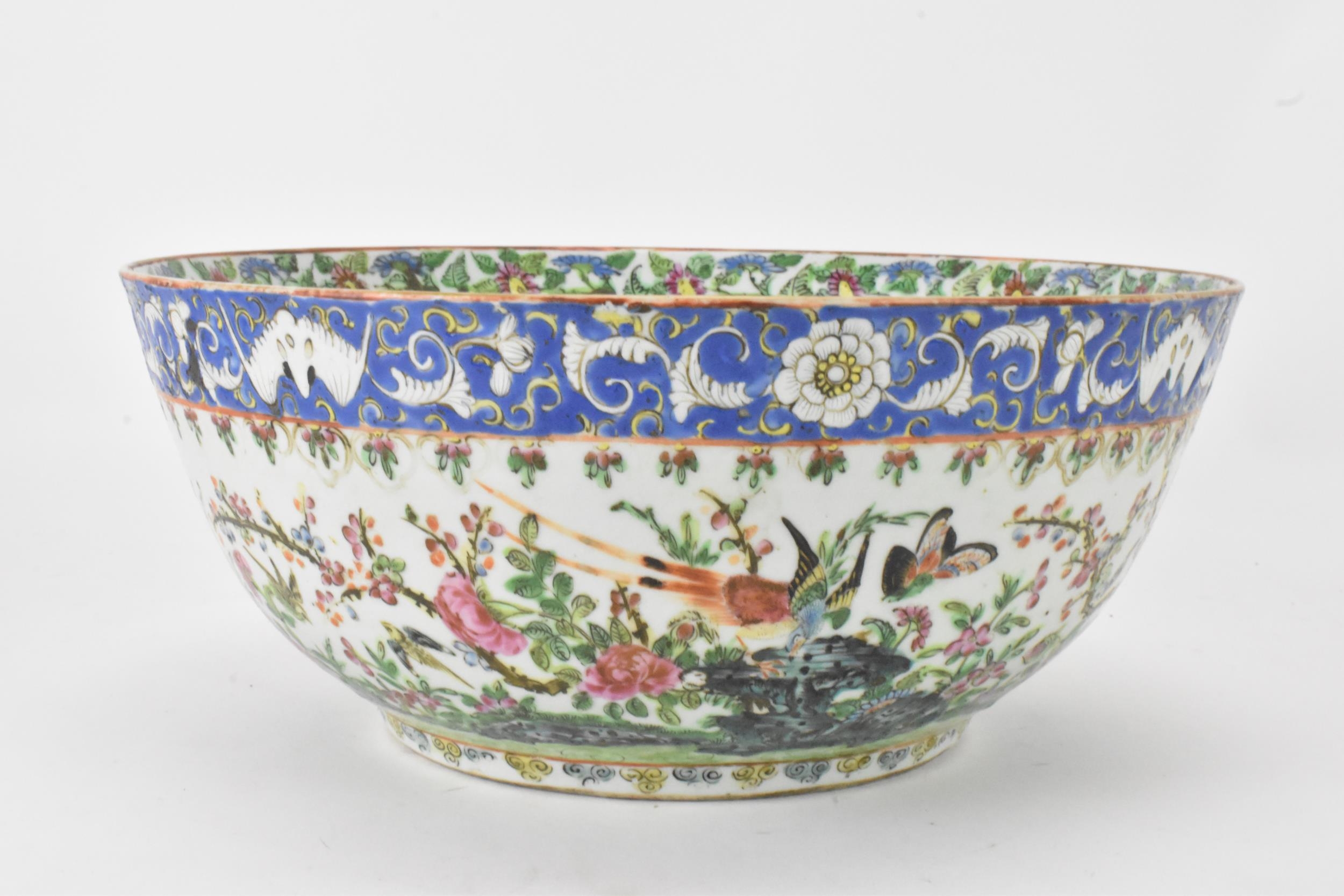 A near pair of Chinese export Canton famille rose punch bowls, Qing dynasty, late 19th century, - Image 9 of 15