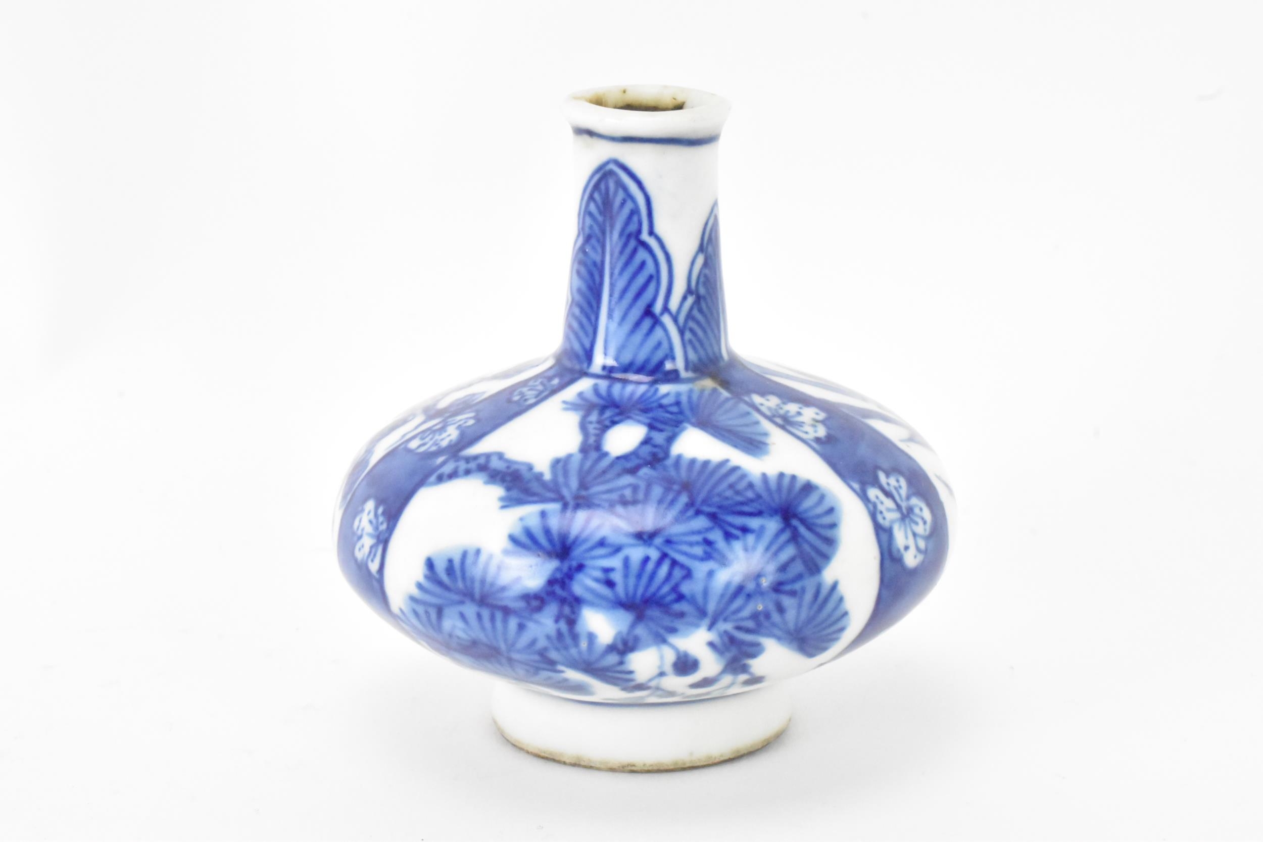 A Chinese miniature vase, Kangxi period (1660-1722) of squat baluster shape decorated in blue and - Image 2 of 5