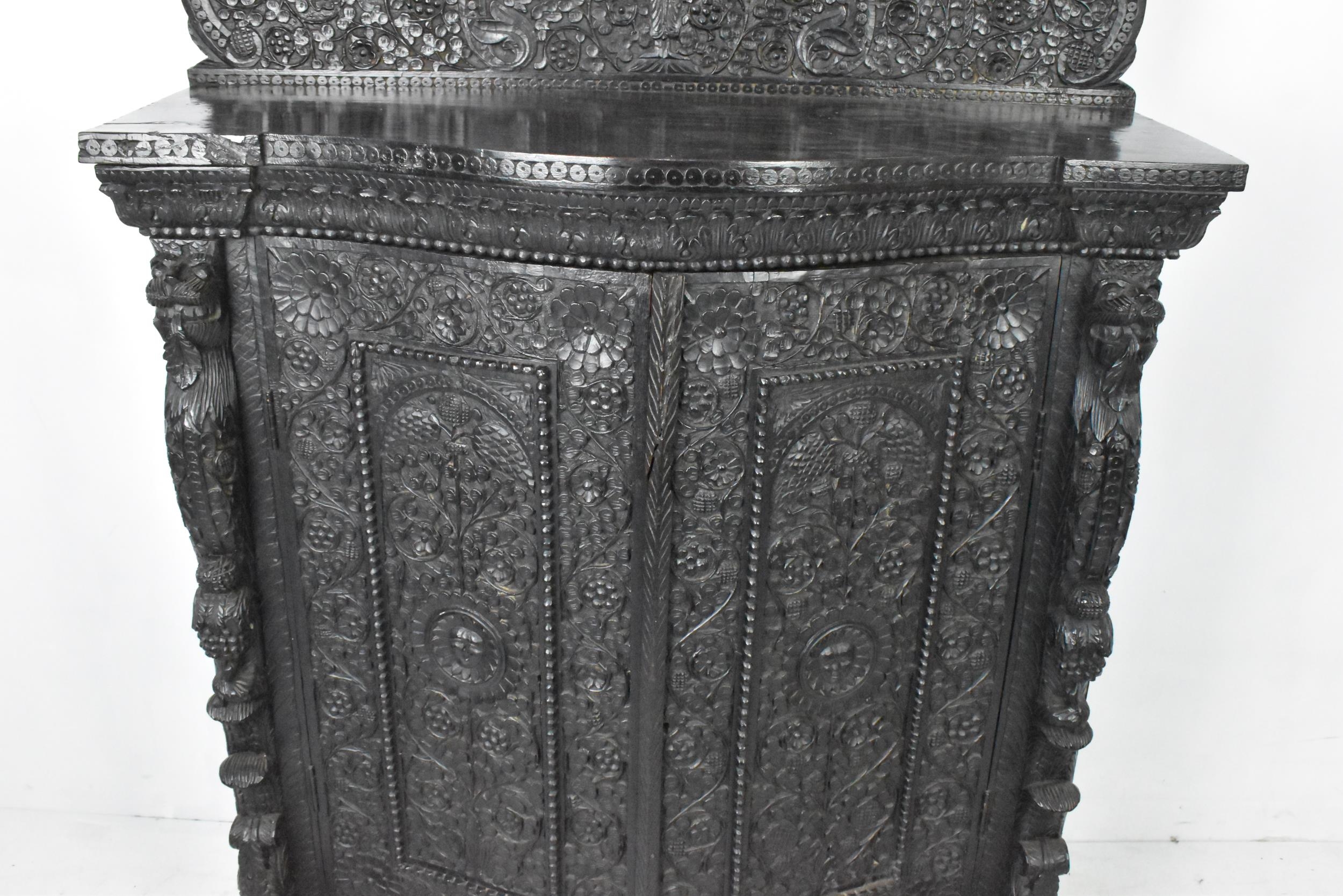 A 19th century Anglo Indian colonial black lacquered hardwood cabinet, serpentine fronted and - Image 3 of 7