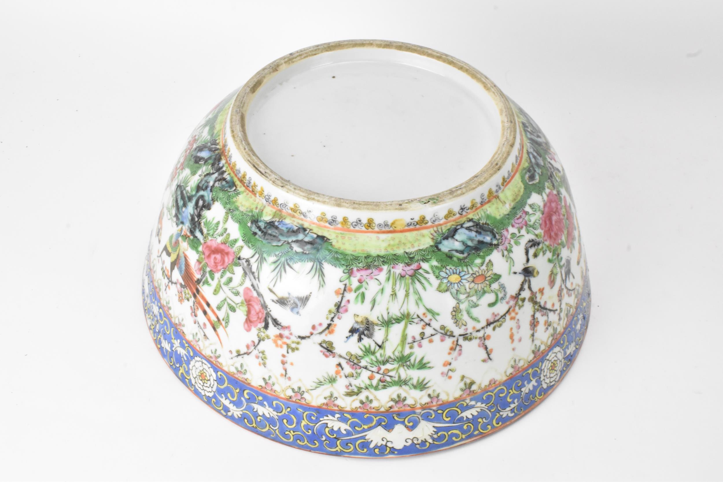 A near pair of Chinese export Canton famille rose punch bowls, Qing dynasty, late 19th century, - Image 7 of 15