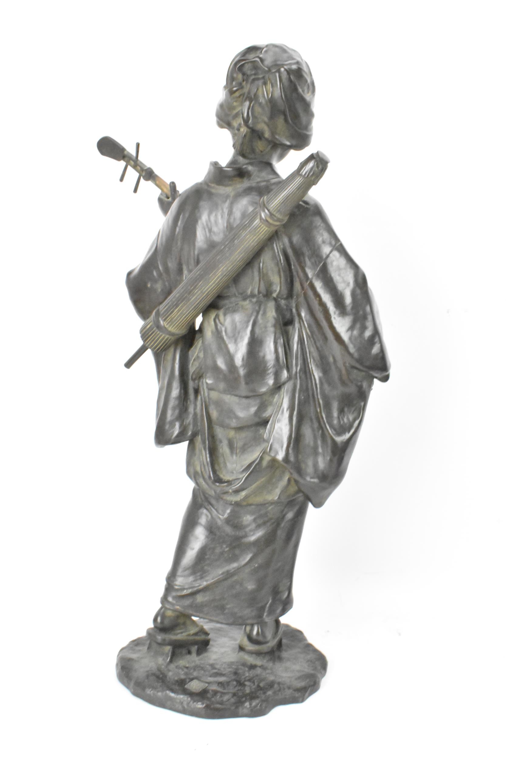 A Japanese Meiji period bronze figure of a bijin musician, wearing a kimono and playing a shamisen - Image 3 of 6