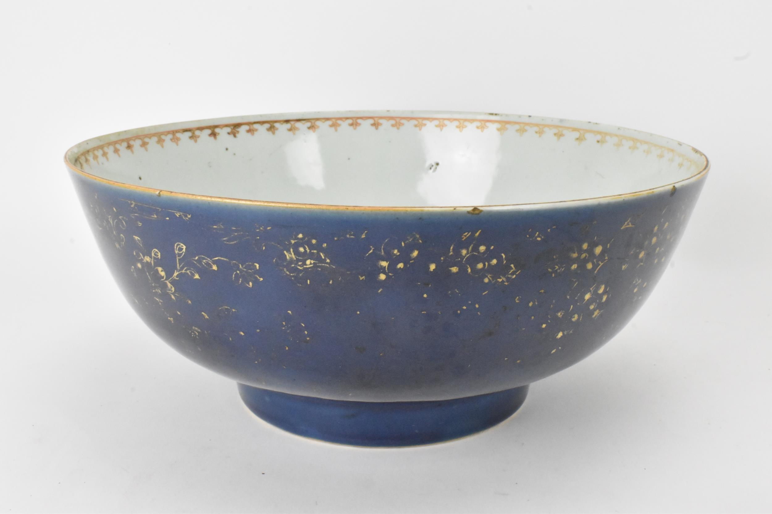 A large Chinese export Qianlong footed bowl, in a powder blue glaze and decorated with gilt flora to - Image 4 of 6