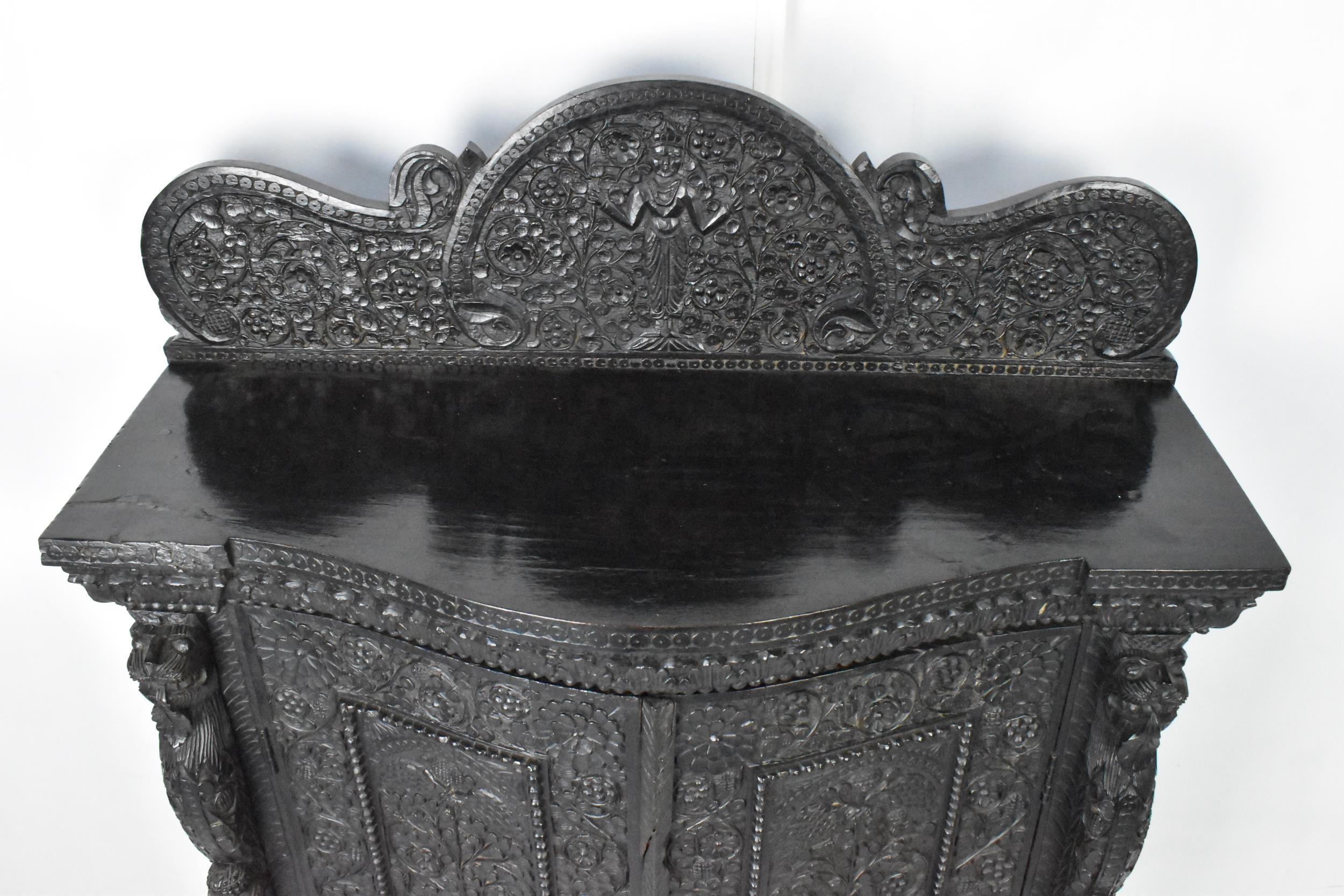 A 19th century Anglo Indian colonial black lacquered hardwood cabinet, serpentine fronted and - Image 2 of 7