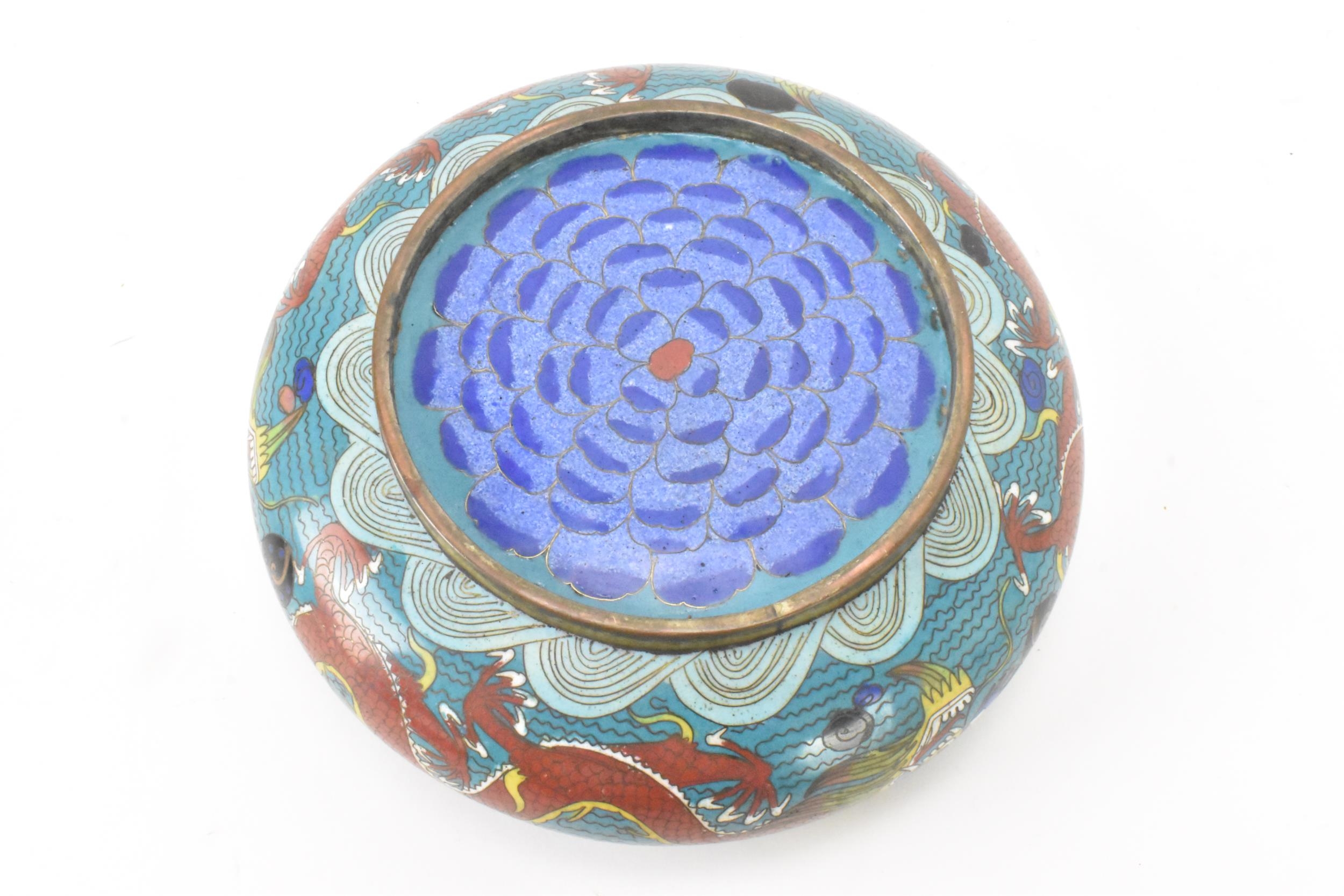 A Chinese cloisonne bowl, late 19th/early 20th century, of shallow form, decorated on a blue - Image 6 of 6