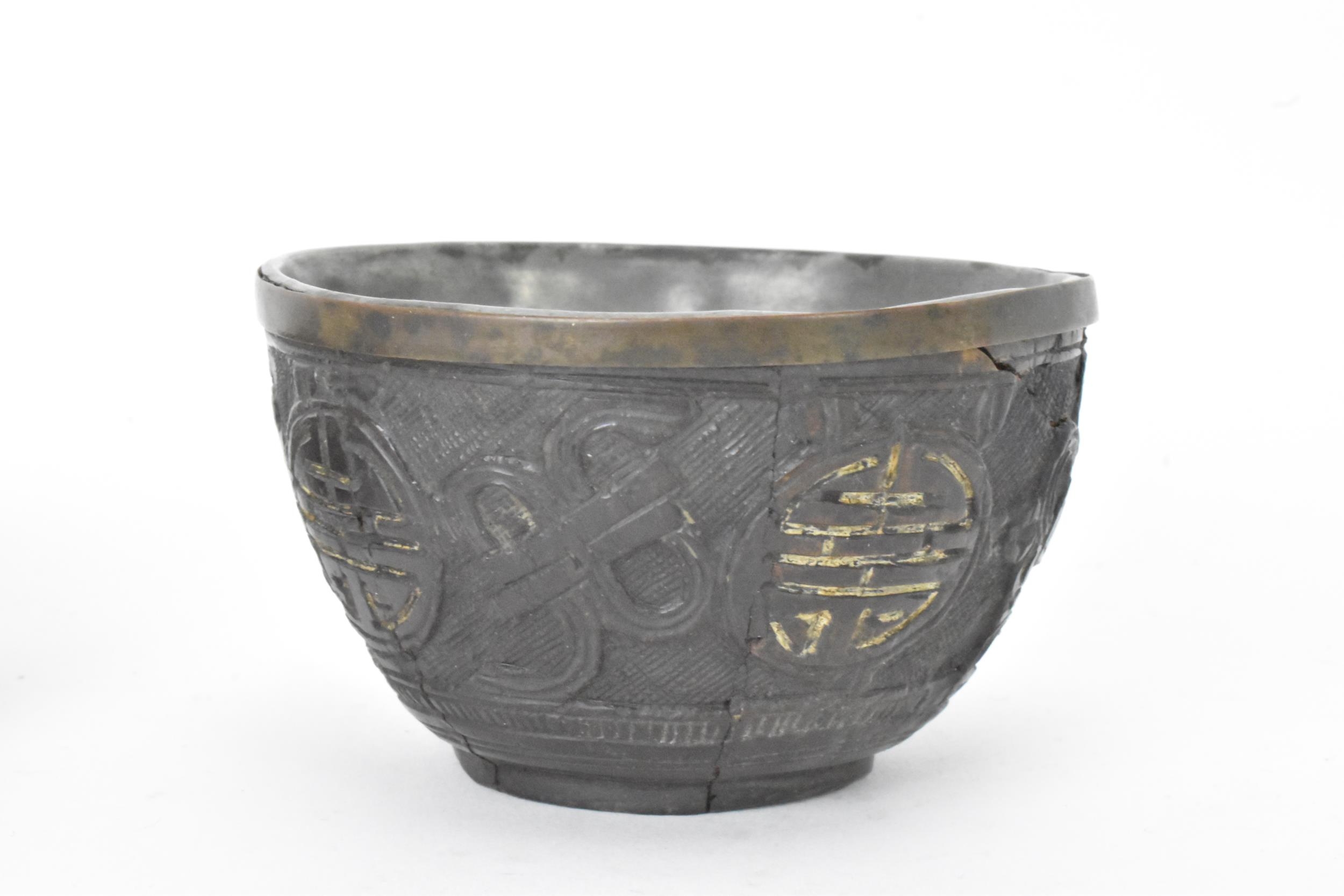 A Chinese late 19th/early 20th century coconut carved cup and saucer, both with pewter liners and - Image 2 of 8
