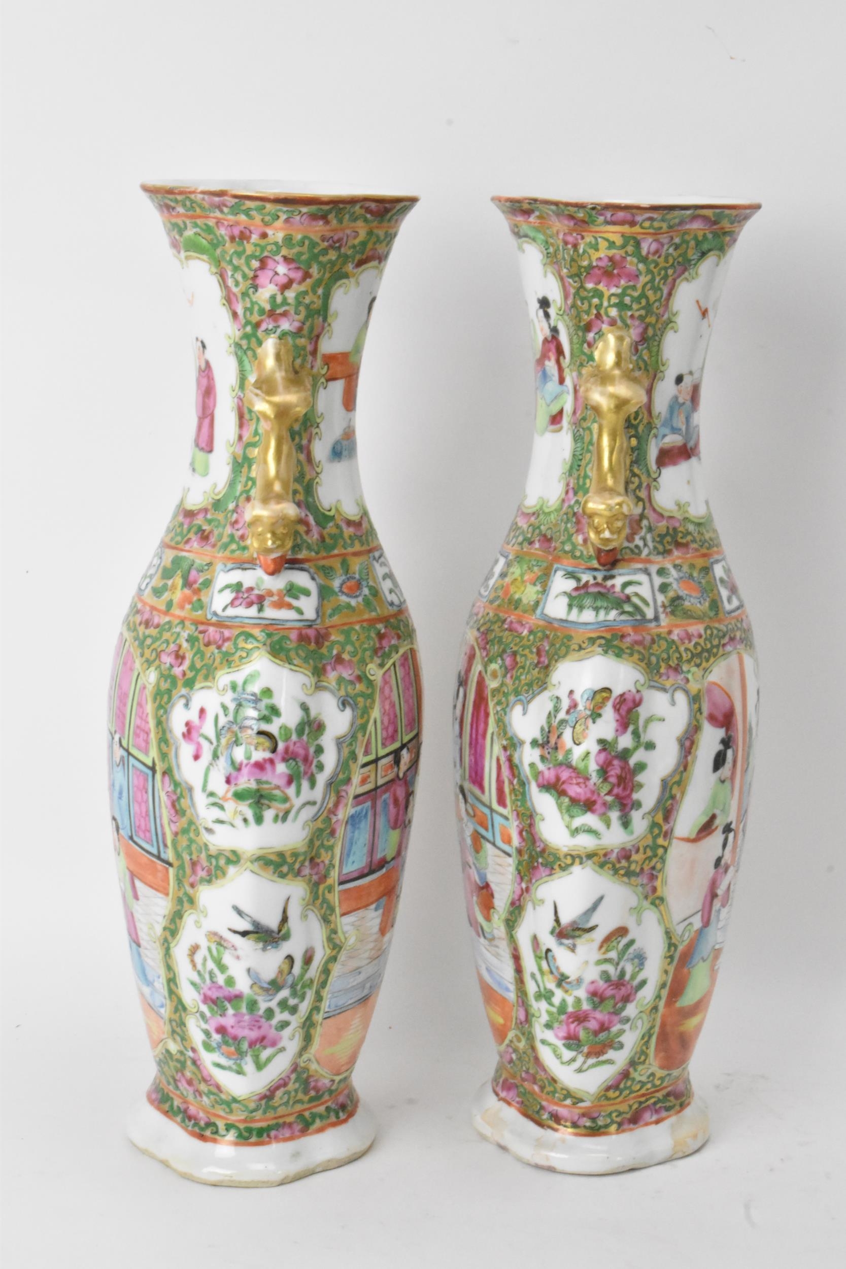 A pair of Chinese export Canton Famille Rose vases, Qing Dynasty, late 19th century, in polychrome - Image 4 of 6