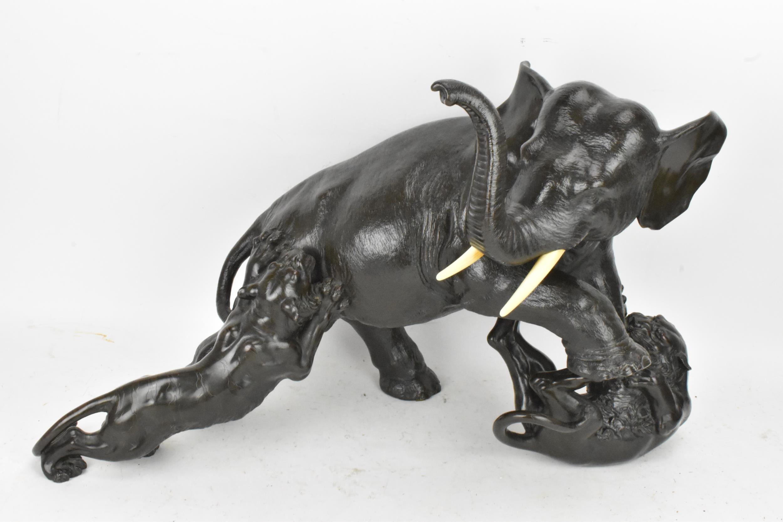 A Japanese Meiji period bronze group modeled as an elephant being attacked by three Siberian tigers, - Image 2 of 15