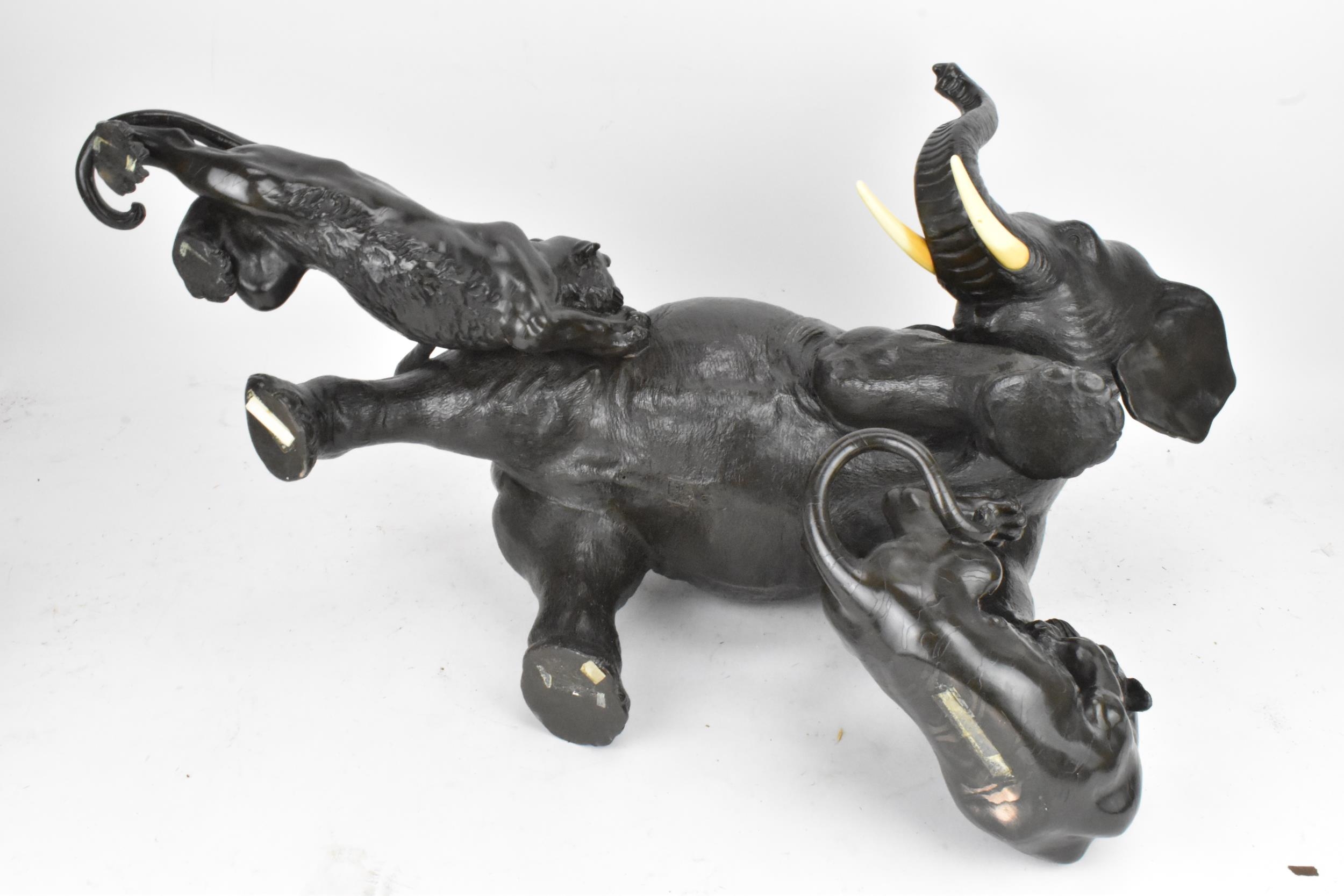 A Japanese Meiji period bronze group modeled as an elephant being attacked by three Siberian tigers, - Image 10 of 15