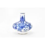 A Chinese miniature vase, Kangxi period (1660-1722) of squat baluster shape decorated in blue and