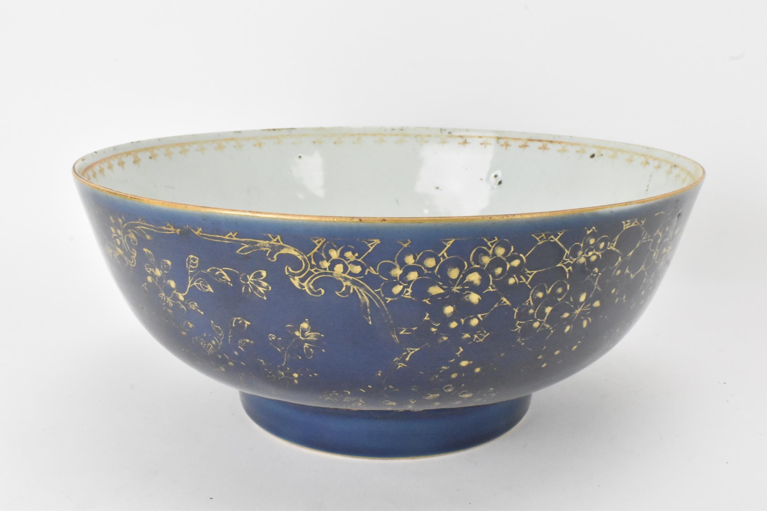 A large Chinese export Qianlong footed bowl, in a powder blue glaze and decorated with gilt flora to - Image 2 of 6