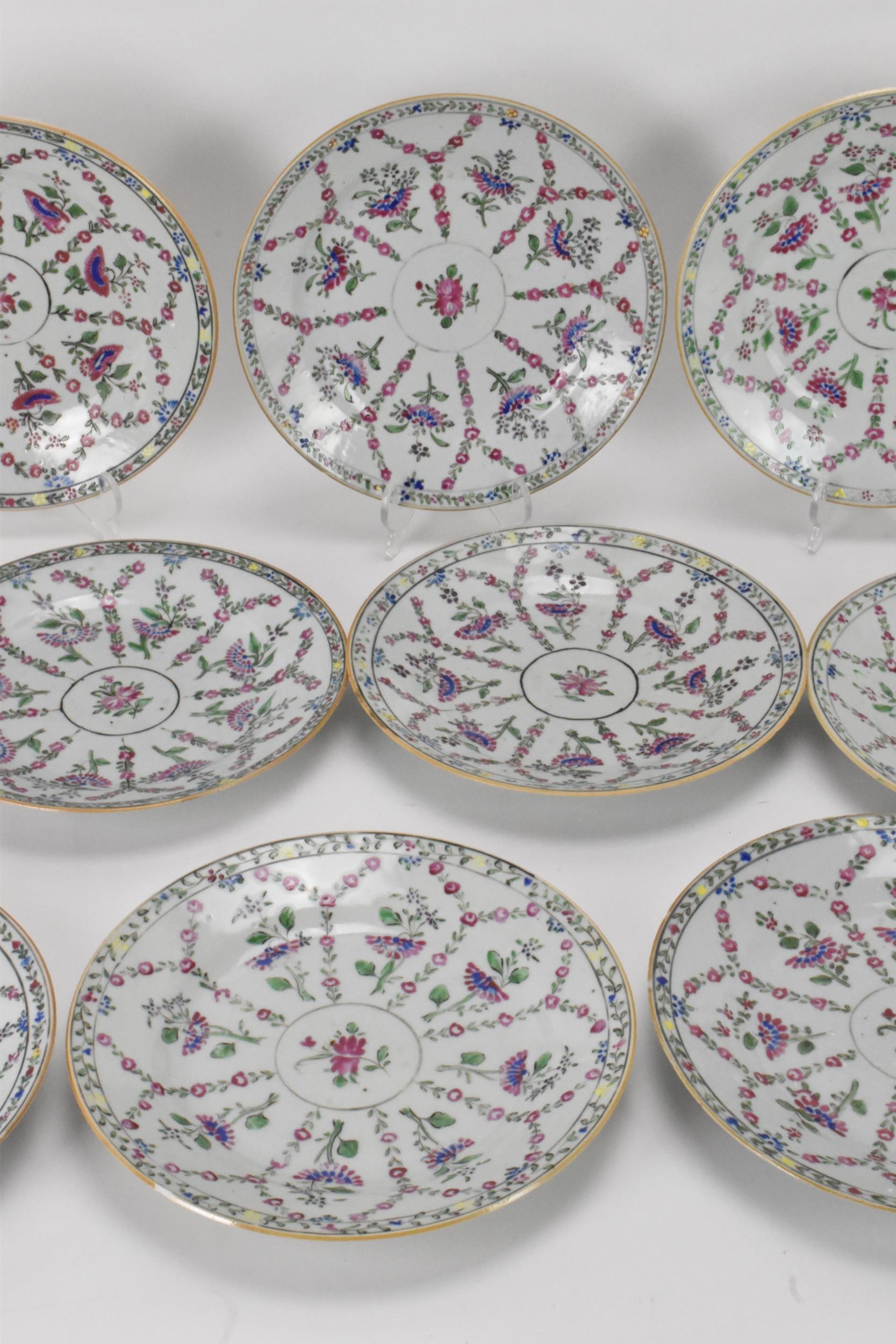 A set of twelve Chinese Qing dynasty famille rose plates, 18th century, having central flower - Image 3 of 5