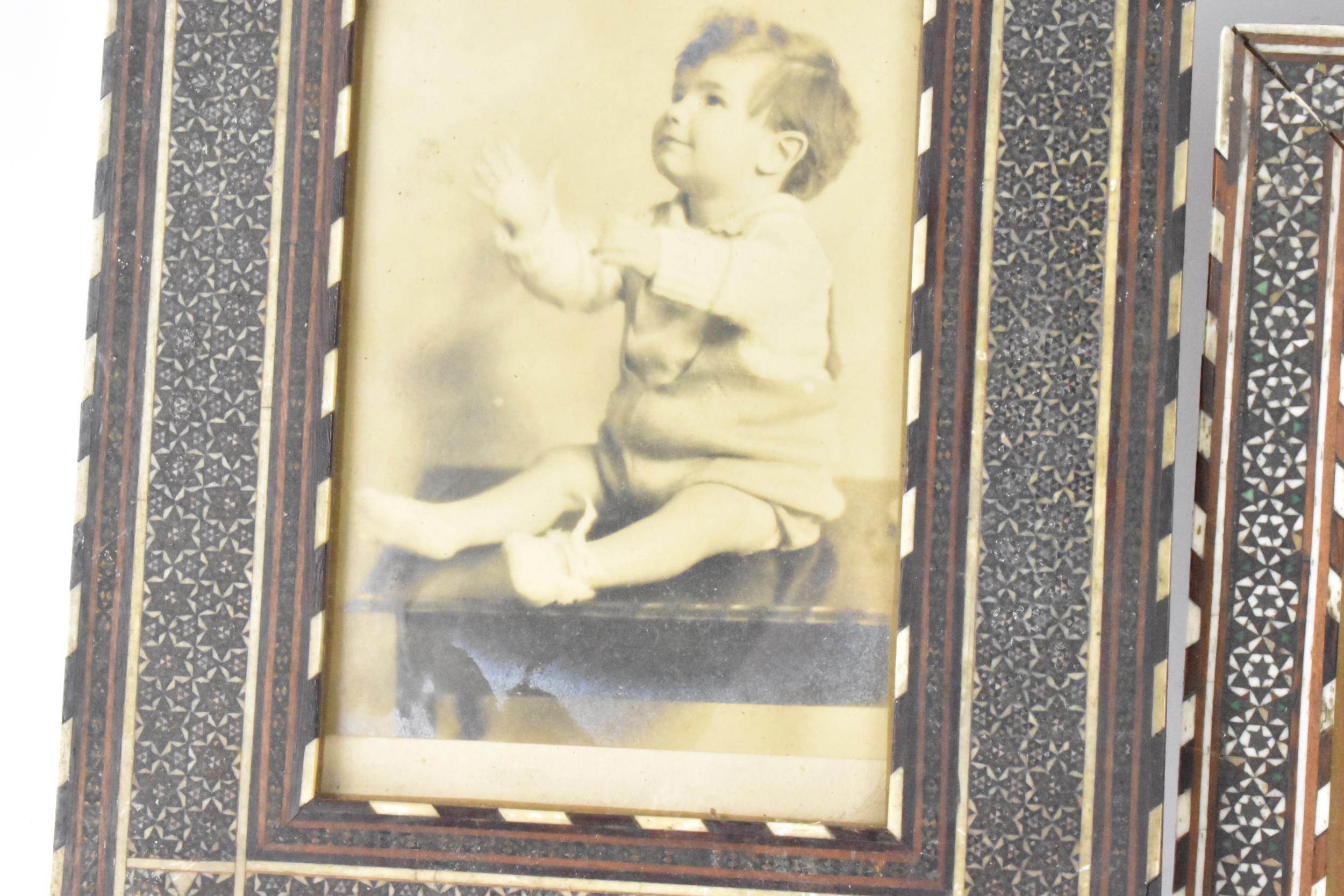 Three similar Persian late Qajar dynasty photograph frames, the profusely inlaid frames having - Image 12 of 14