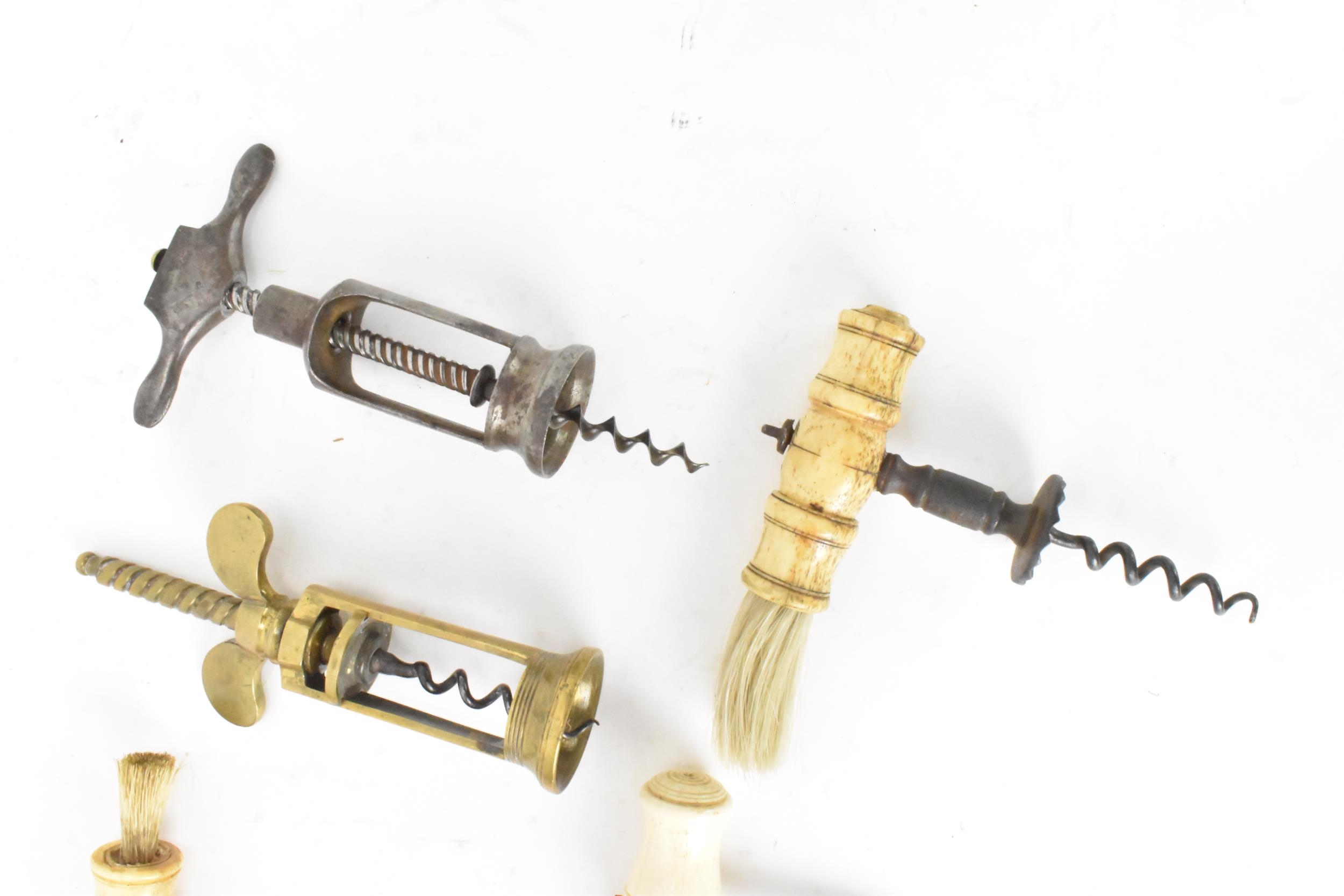 Helixophilia - Seven various corkscrews to include a 19th century brass Coney & Co patent mechanical - Image 2 of 7