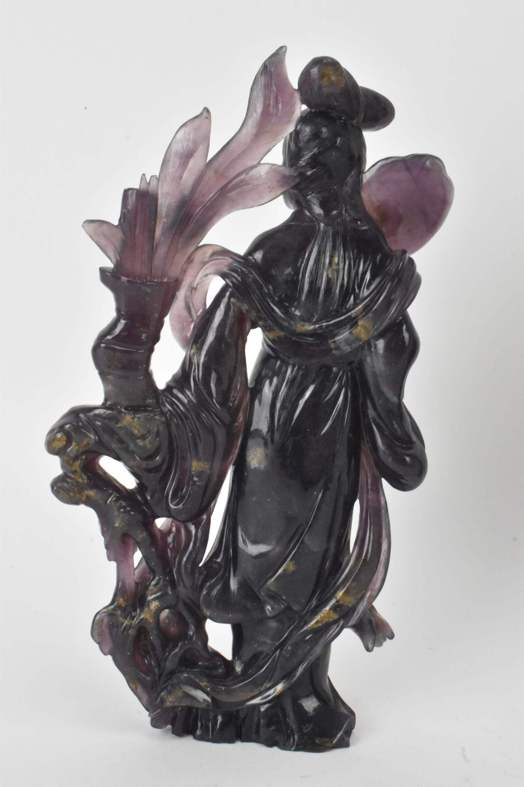 Two Chinese 20th century jadeite carved figures, the green example modeled holding a fan and flowers - Image 3 of 7
