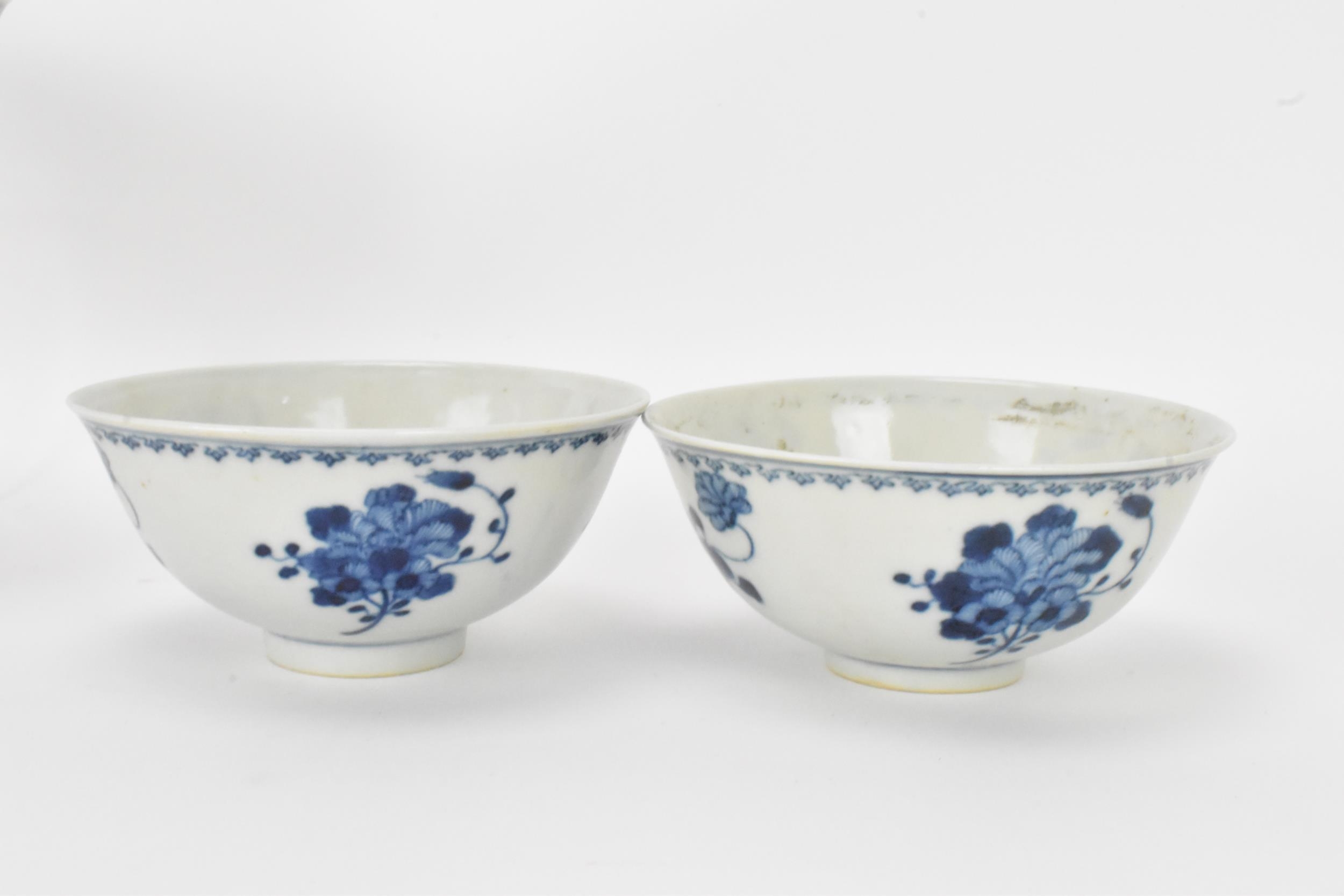 A set of four Qing dynasty, Guangxu period blue and white porcelain bowls, with floral decoration, - Image 3 of 9