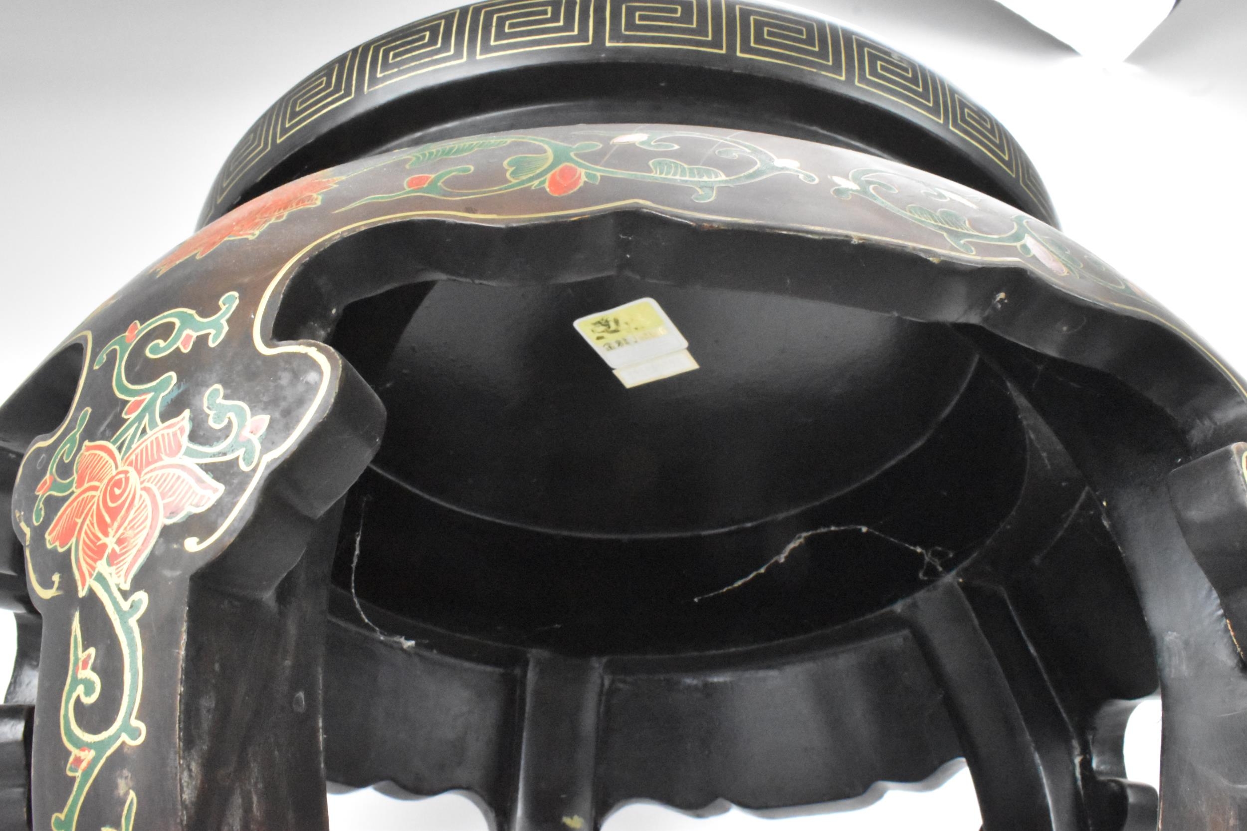 A Chinese 20th century occasional table, having a black lacquered frame supported by five curved - Image 7 of 7