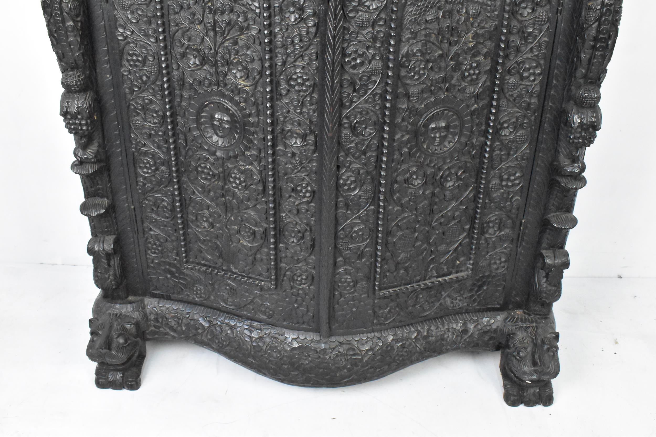 A 19th century Anglo Indian colonial black lacquered hardwood cabinet, serpentine fronted and - Image 4 of 7