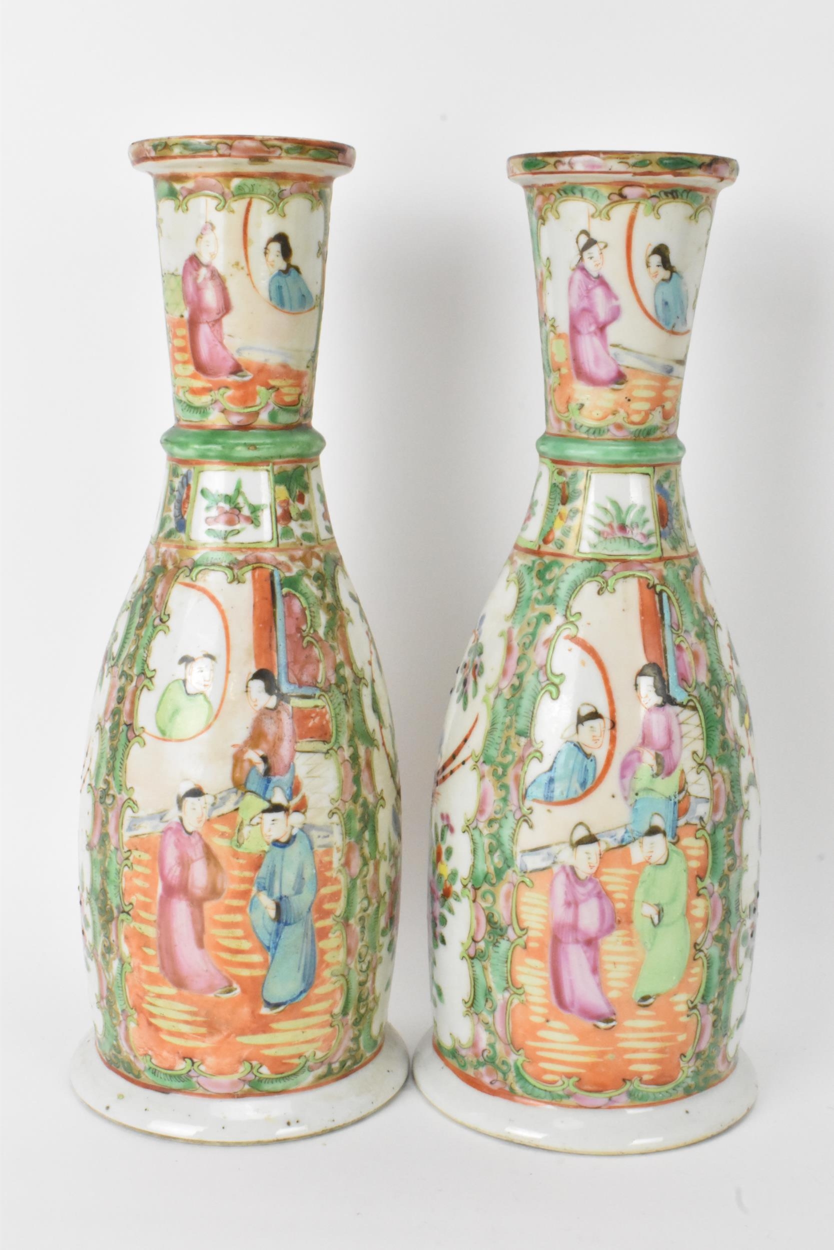 A pair of Chinese late 19th century Canton Famille Rose vases, of cylindrical tapered form, the - Image 3 of 8