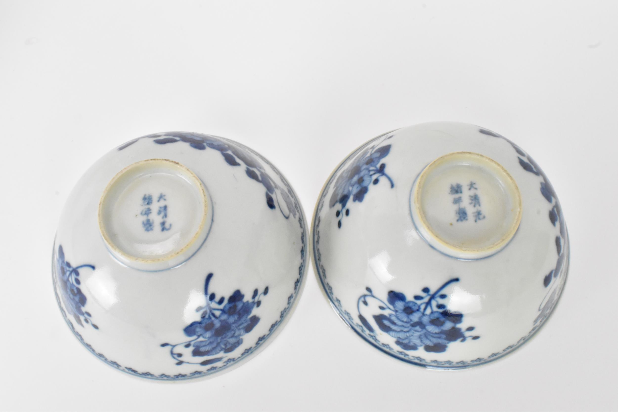 A set of four Qing dynasty, Guangxu period blue and white porcelain bowls, with floral decoration, - Image 6 of 9