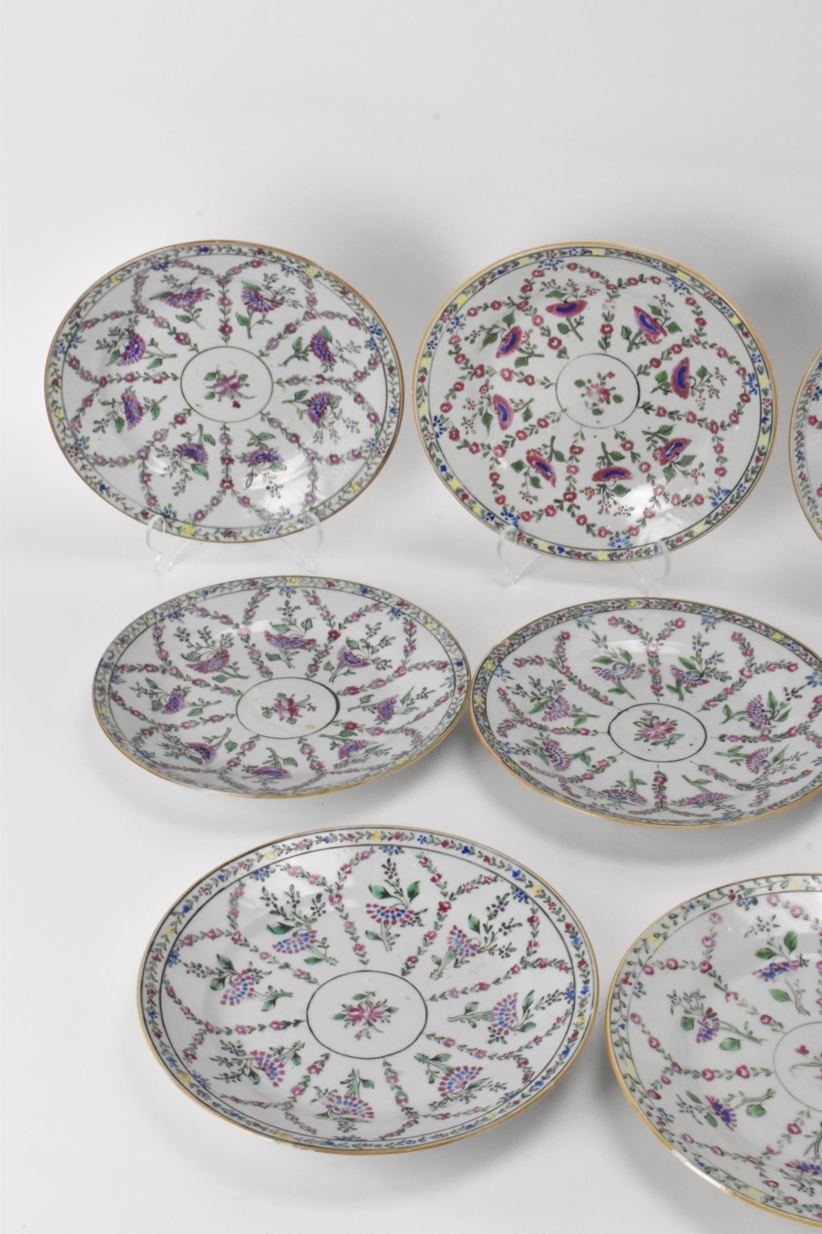 A set of twelve Chinese Qing dynasty famille rose plates, 18th century, having central flower - Image 4 of 5