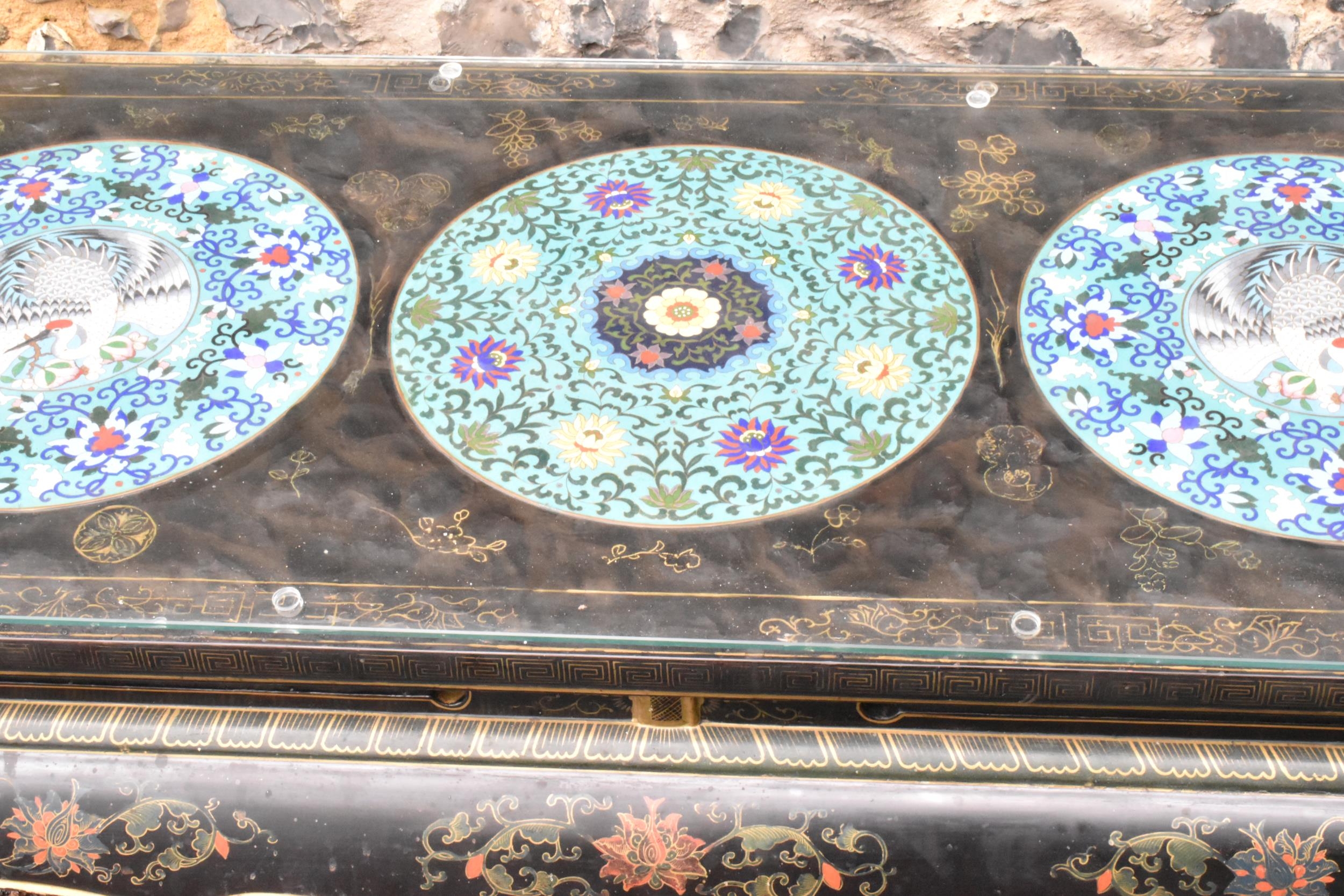 A Chinese 20th century cloisonne coffee table, the black lacquered low coffee table with a - Image 8 of 10