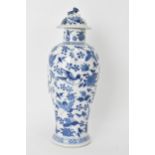 A Chinese Qing dynasty blue and white lidded vase, late 19th/early 20th century, decorated with