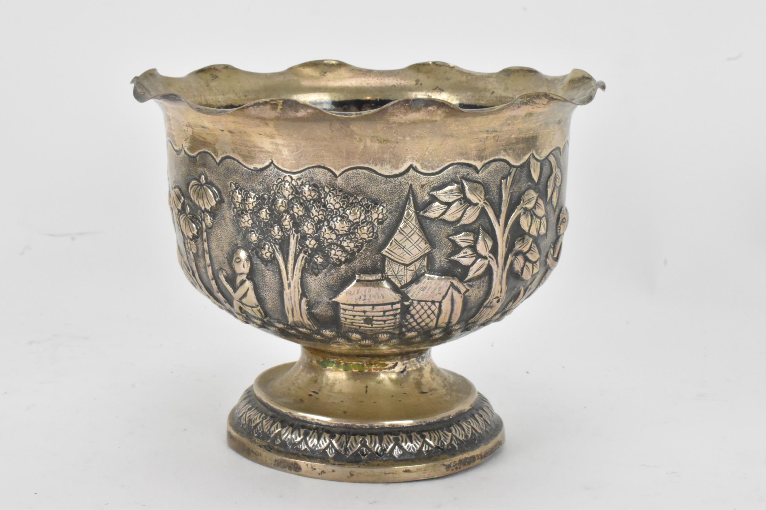 An early 20th century Anglo-Indian white metal bowl, having a crimped rim and embossed decoration - Image 3 of 6