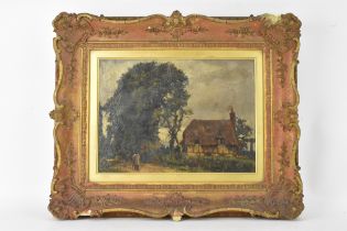 A late 19th century oil on canvas landscape scene depicting a cottage with a figure to the