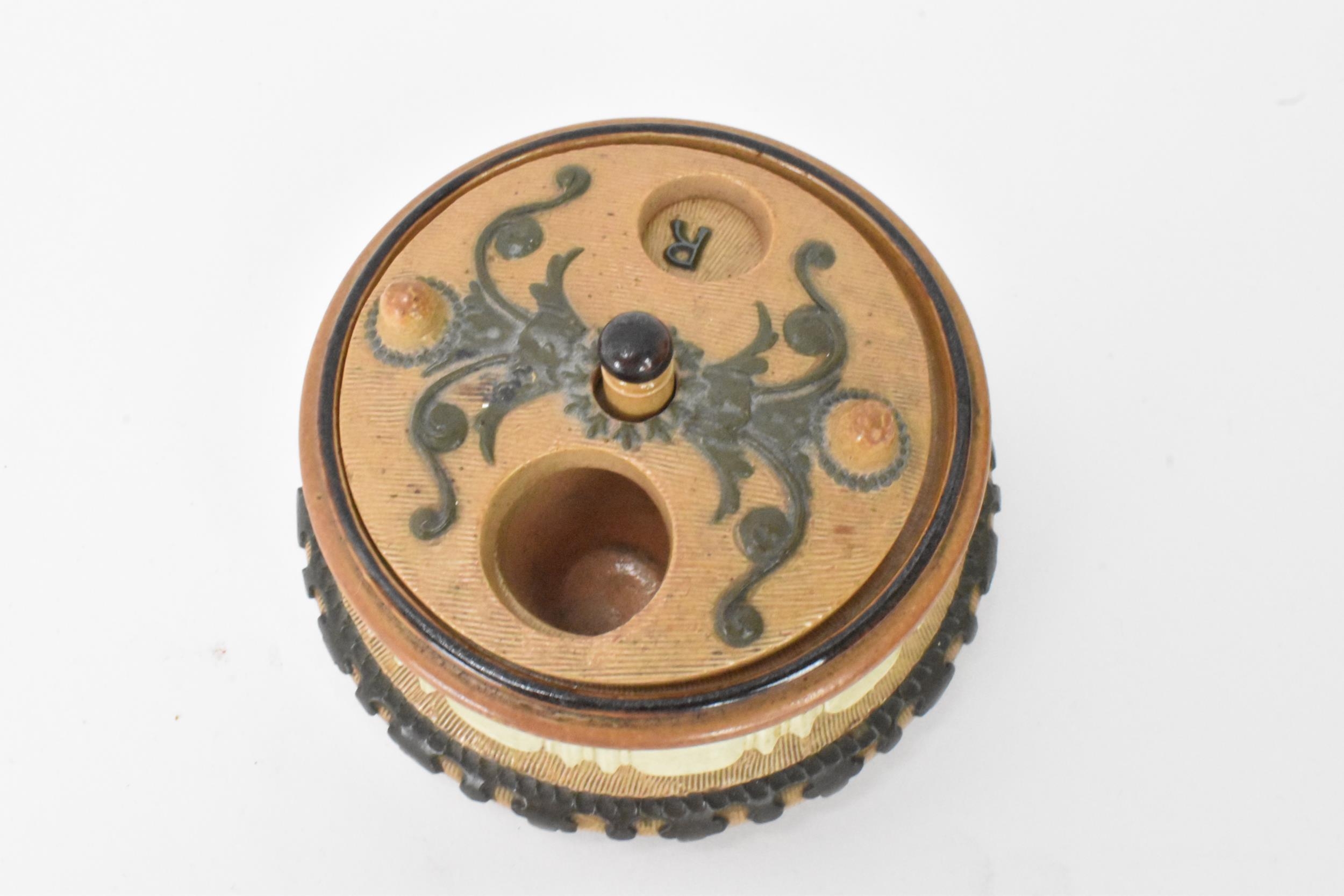 A rare and unusual Doulton stoneware container, possibly an inkwell with revolving lid, the well - Image 6 of 10