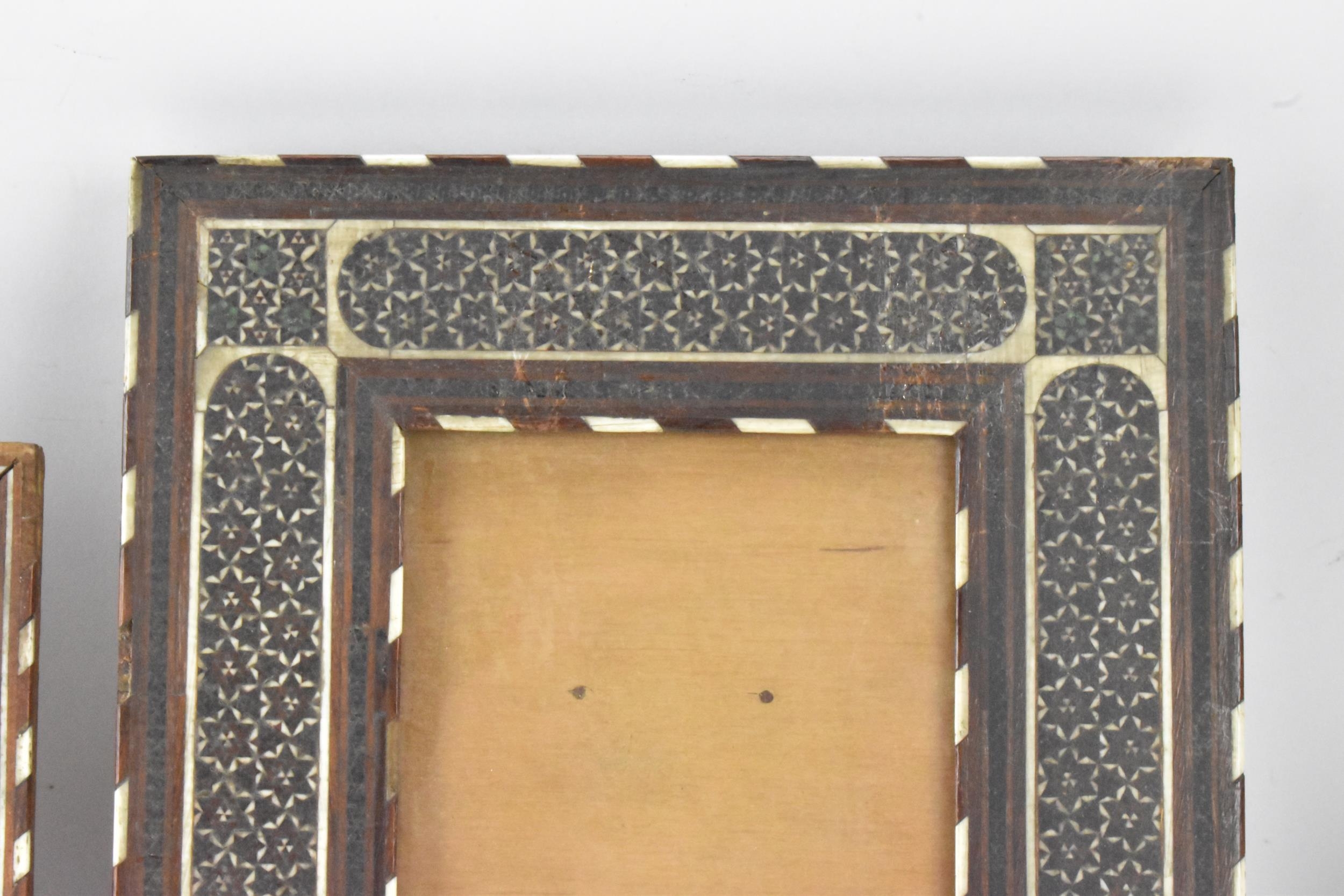 Three similar Persian late Qajar dynasty photograph frames, the profusely inlaid frames having - Image 3 of 14