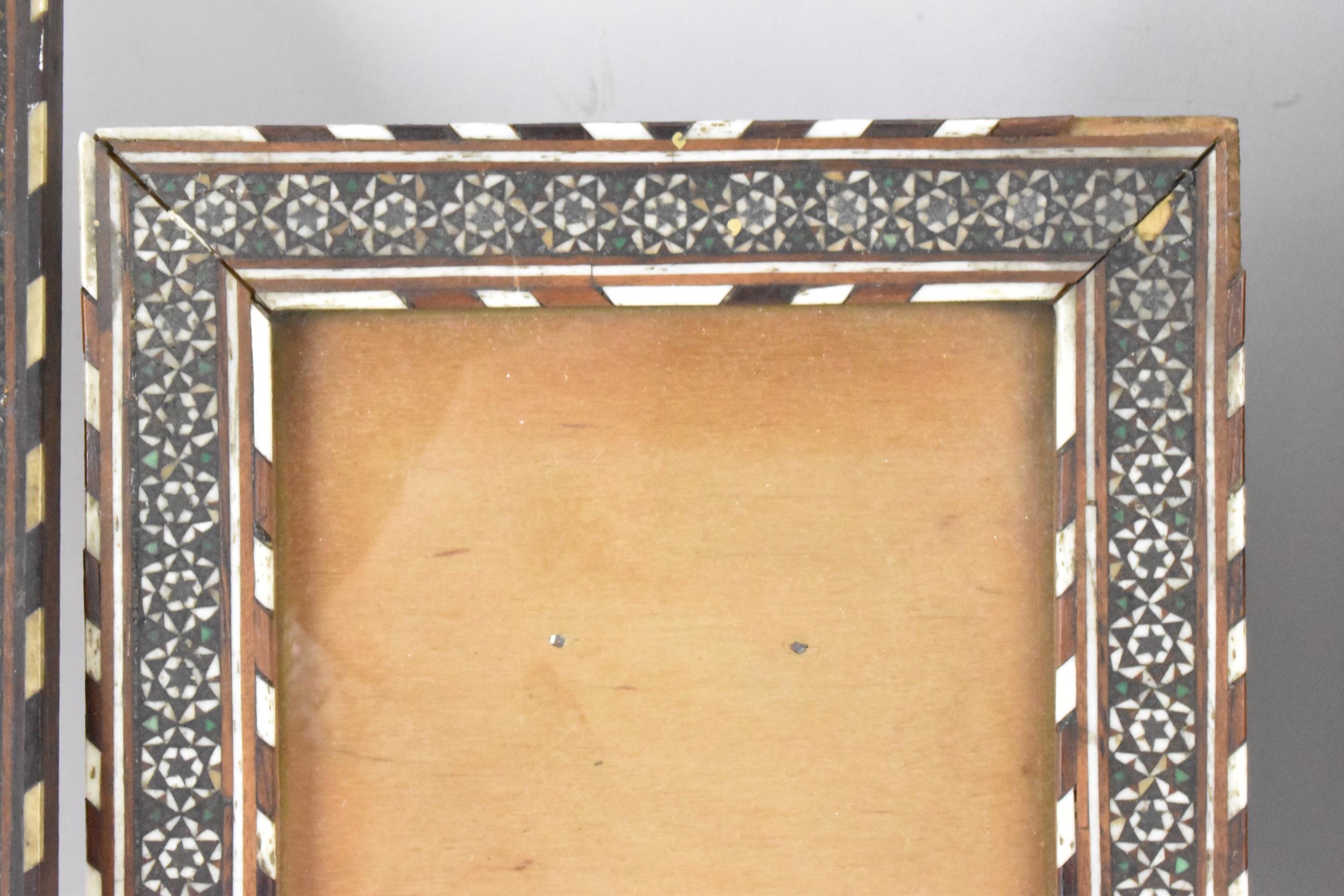 Three similar Persian late Qajar dynasty photograph frames, the profusely inlaid frames having - Image 7 of 14