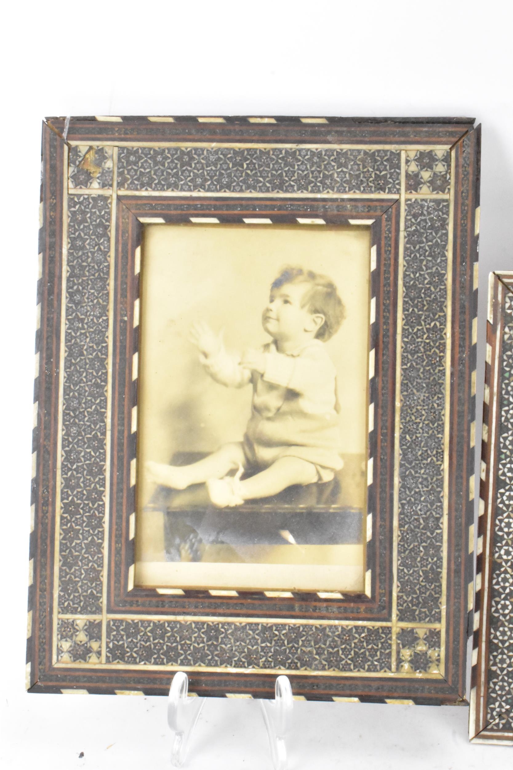 Three similar Persian late Qajar dynasty photograph frames, the profusely inlaid frames having - Image 10 of 14