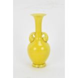 A 20th century Japanese miniature famille jaune glazed vase, having an elongated neck, flared rim