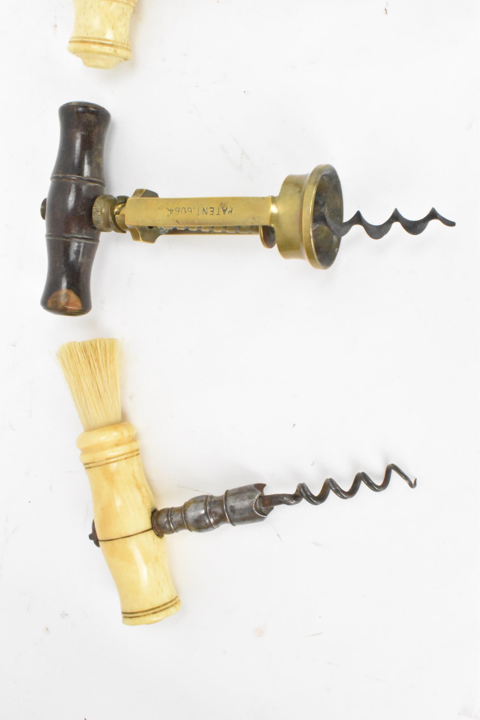 Helixophilia - Seven various corkscrews to include a 19th century brass Coney & Co patent mechanical - Image 4 of 7