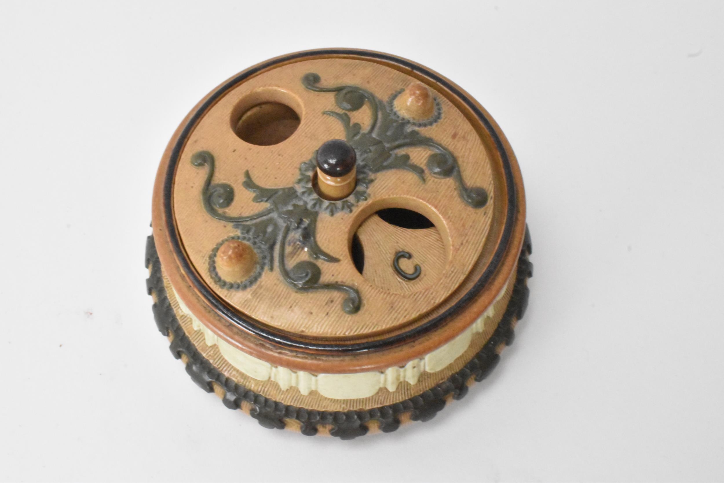 A rare and unusual Doulton stoneware container, possibly an inkwell with revolving lid, the well - Image 7 of 10