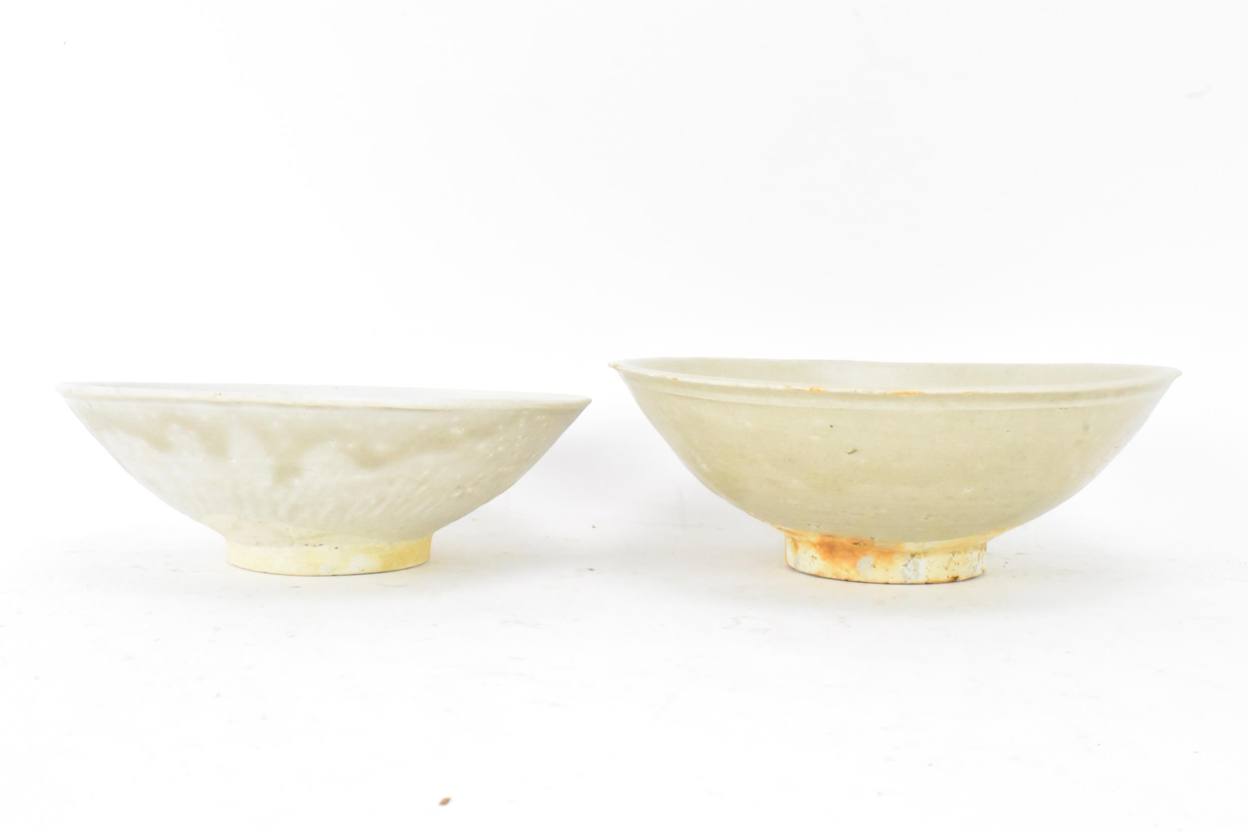 Two Chinese Song dynasty (960-1279) celadon glazed bowls, from a shipwreck in the South China