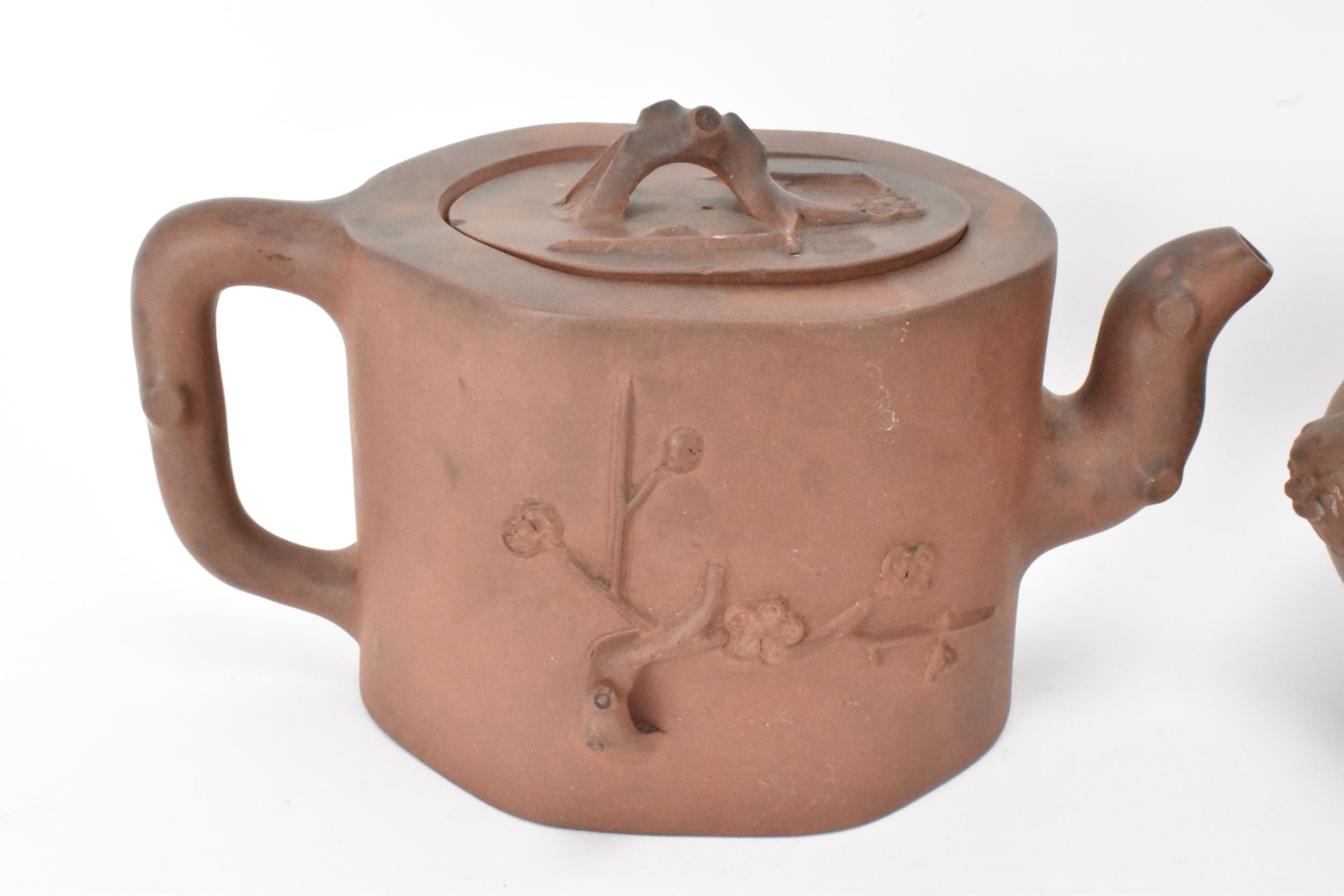 A Chinese Yixing teapot and bowl, the teapot relief decorated with flora and naturalistic forms, - Image 2 of 9