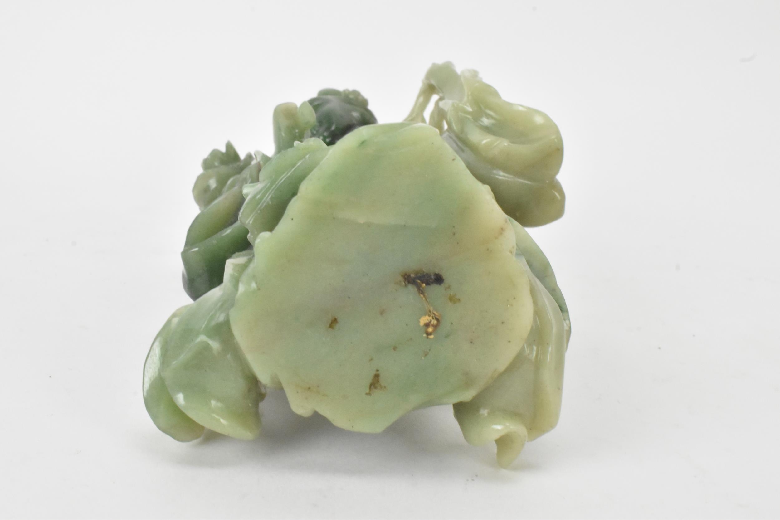 Two Chinese 20th century jadeite carved figures, the green example modeled holding a fan and flowers - Image 7 of 7