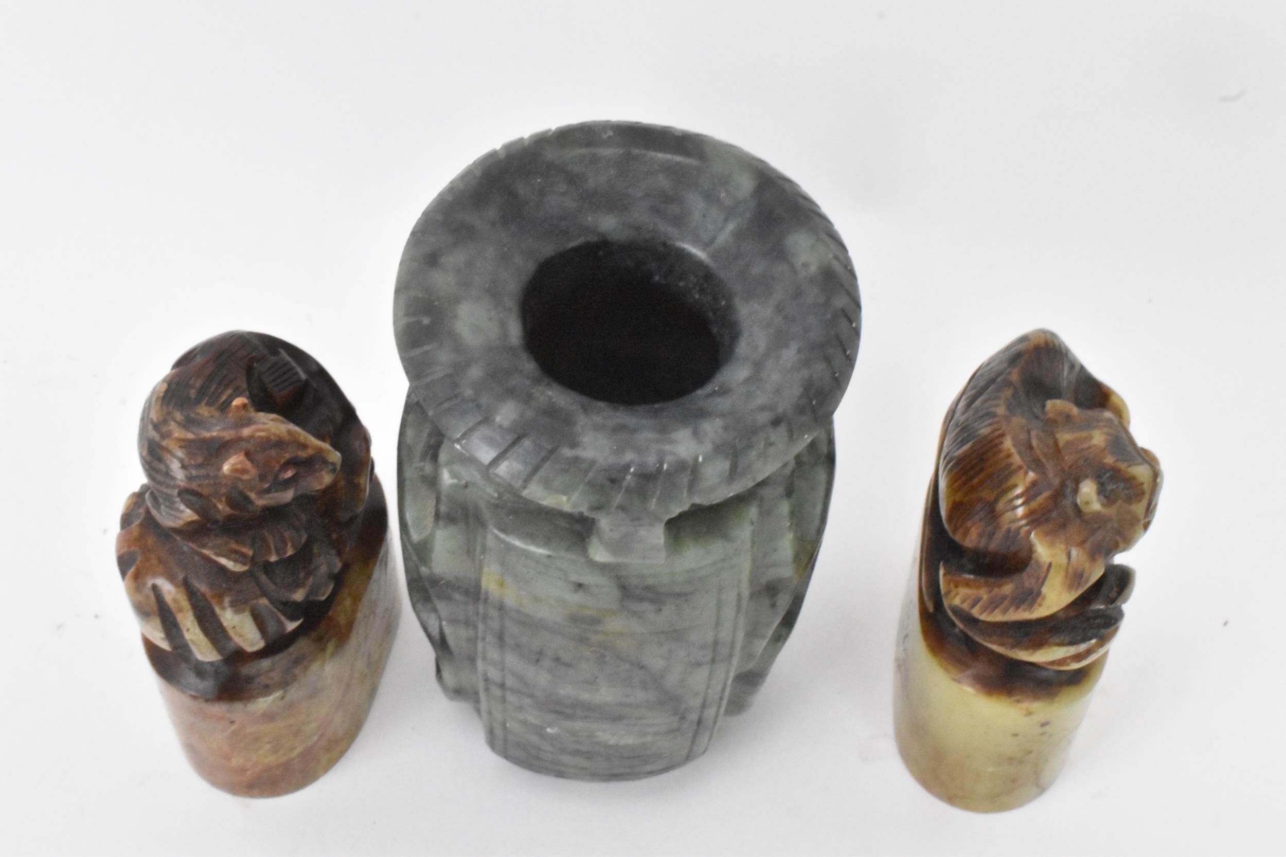 Two Chinese soapstone seals carved with animals raised on oval formed bases carved with landscape - Image 5 of 6