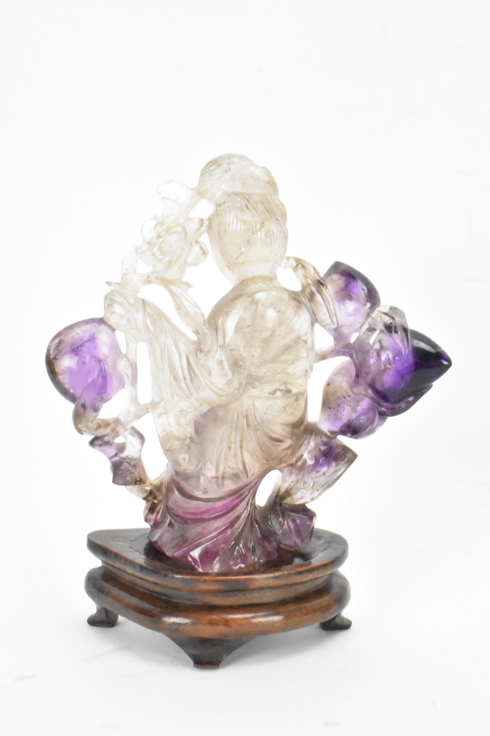 A 20th century Chinese carved amethyst figure of Guanyin, the goddess of mercy, in a seated position - Image 3 of 7